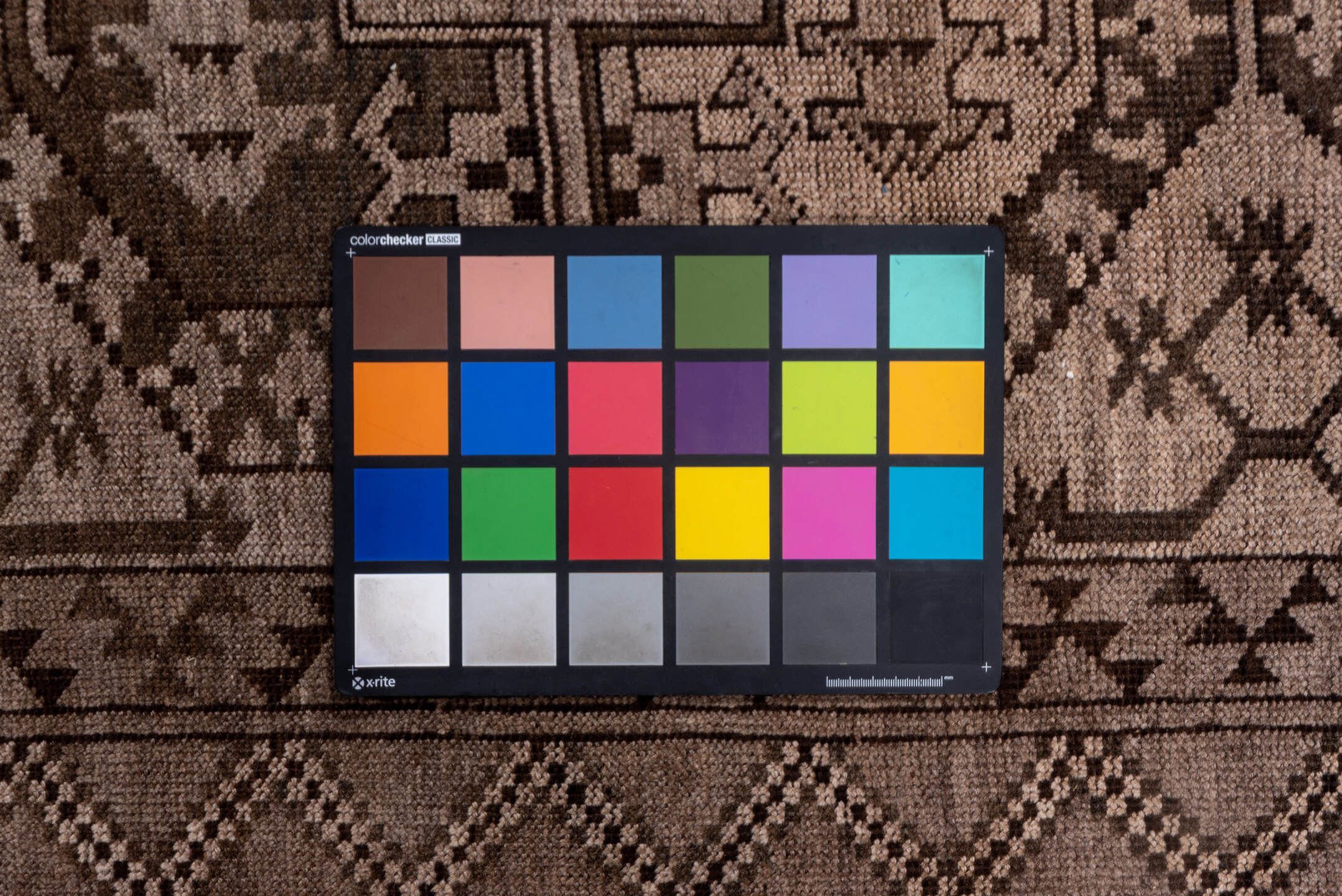 6' x 9' one-of-a-kind handmade vintage Afghan medium size rug. Color palette: brown, gray, light gray, off-white, pink