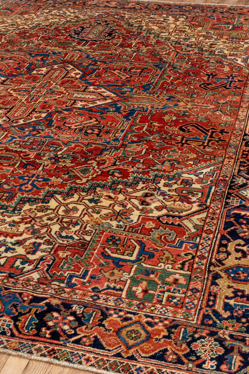 8' x 10' one-of-a-kind handmade antique Heriz large size rug. Color palette: rust, ivory, navy, terracotta, sage, coral