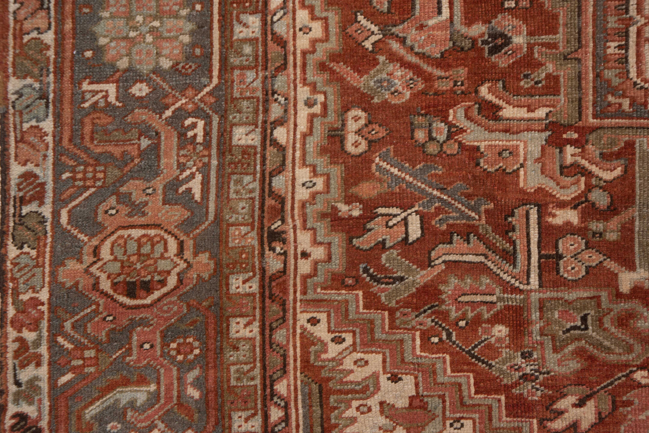 9' x 12' one-of-a-kind handmade vintage Heriz large size rug. Color palette: brown, gray, orange, pink, tan