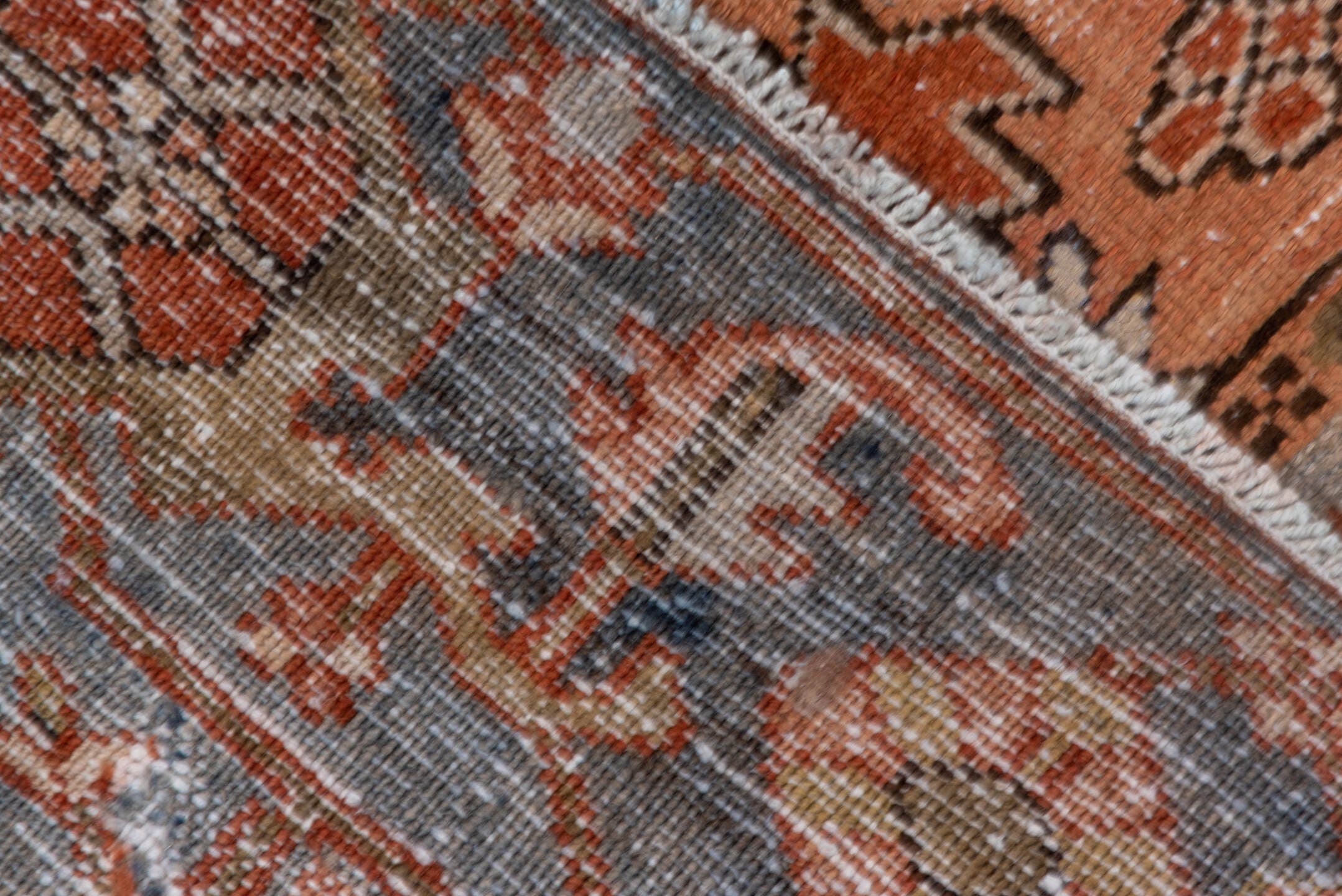 8' x 10' one-of-a-kind handmade antique Serapi large size rug. Color palette: terra cotta, light blue, ivory, rust, taupe