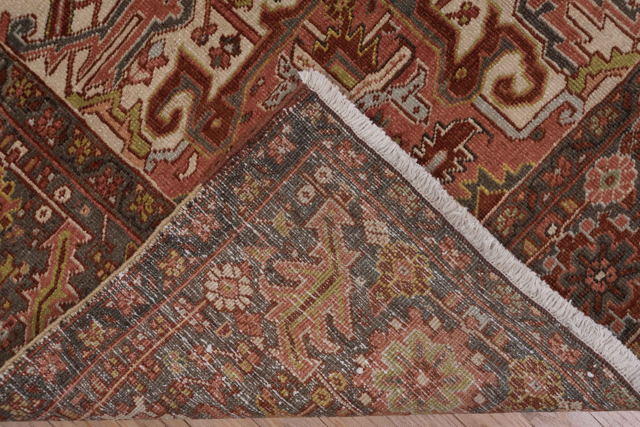 8' x 11' one-of-a-kind handmade antique Heriz large size rug. Color palette: rust, ivory, charcoal, terra cotta, olive