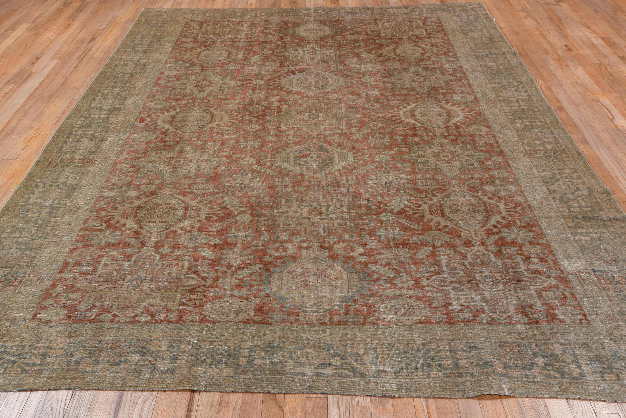 7' x 10' one-of-a-kind handmade antique Karaje large size rug. Color palette: terra cotta, taupe, beige, ivory, slate, camel
