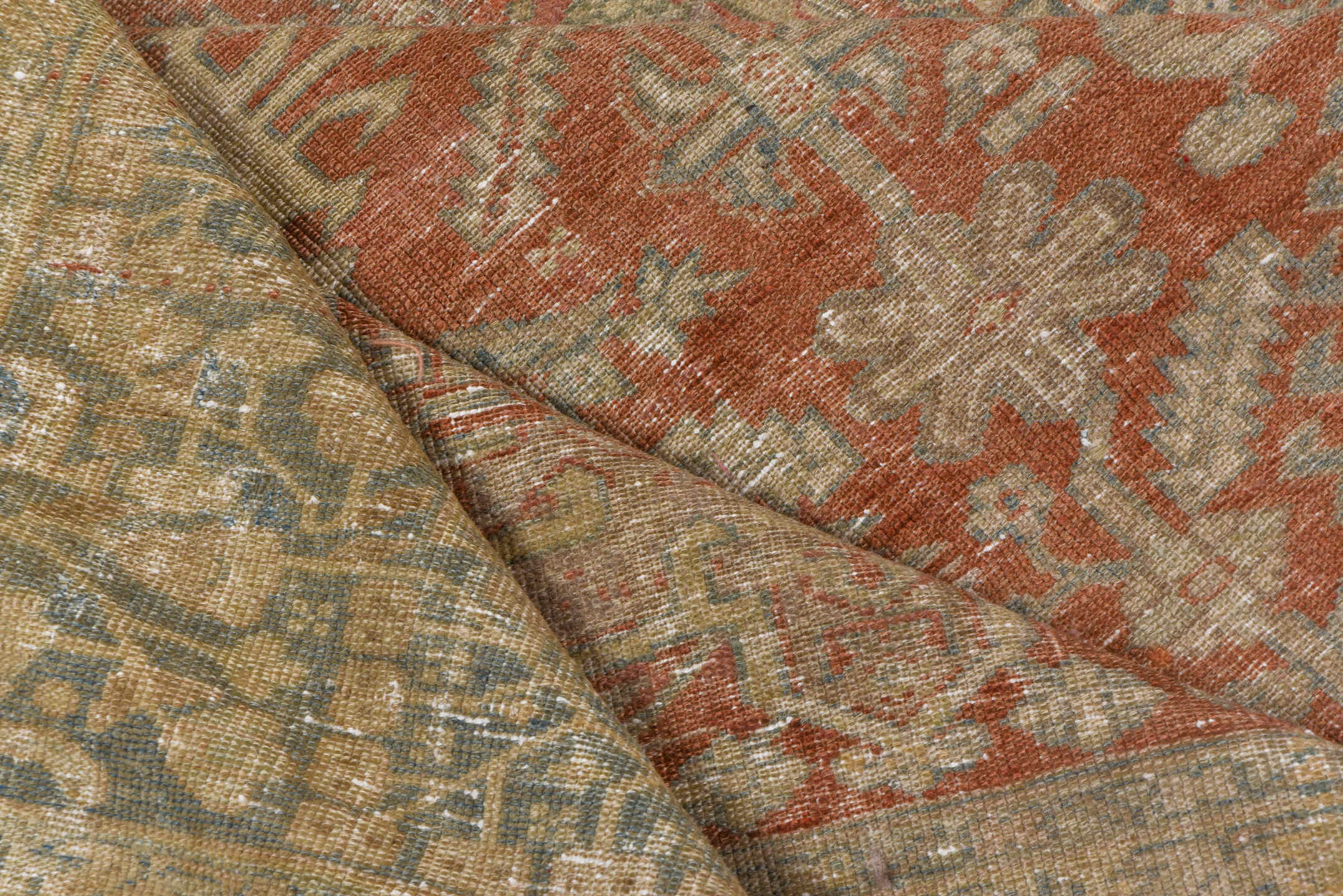 7' x 10' one-of-a-kind handmade antique Karaje large size rug. Color palette: terra cotta, taupe, beige, ivory, slate, camel