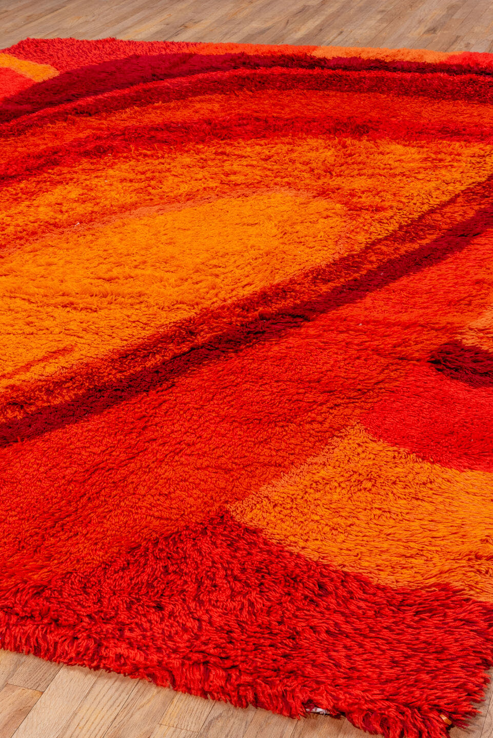 8' x 11' one-of-a-kind handmade vintage Shag large size rug. Color palette: red, orange, crimson, coral, burgundy, peach