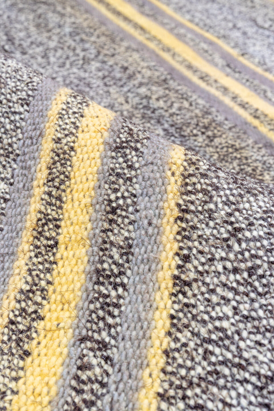 7' x 9' one-of-a-kind handmade antique Flatweave rug. Color palette: gray, ivory, gold, charcoal, black