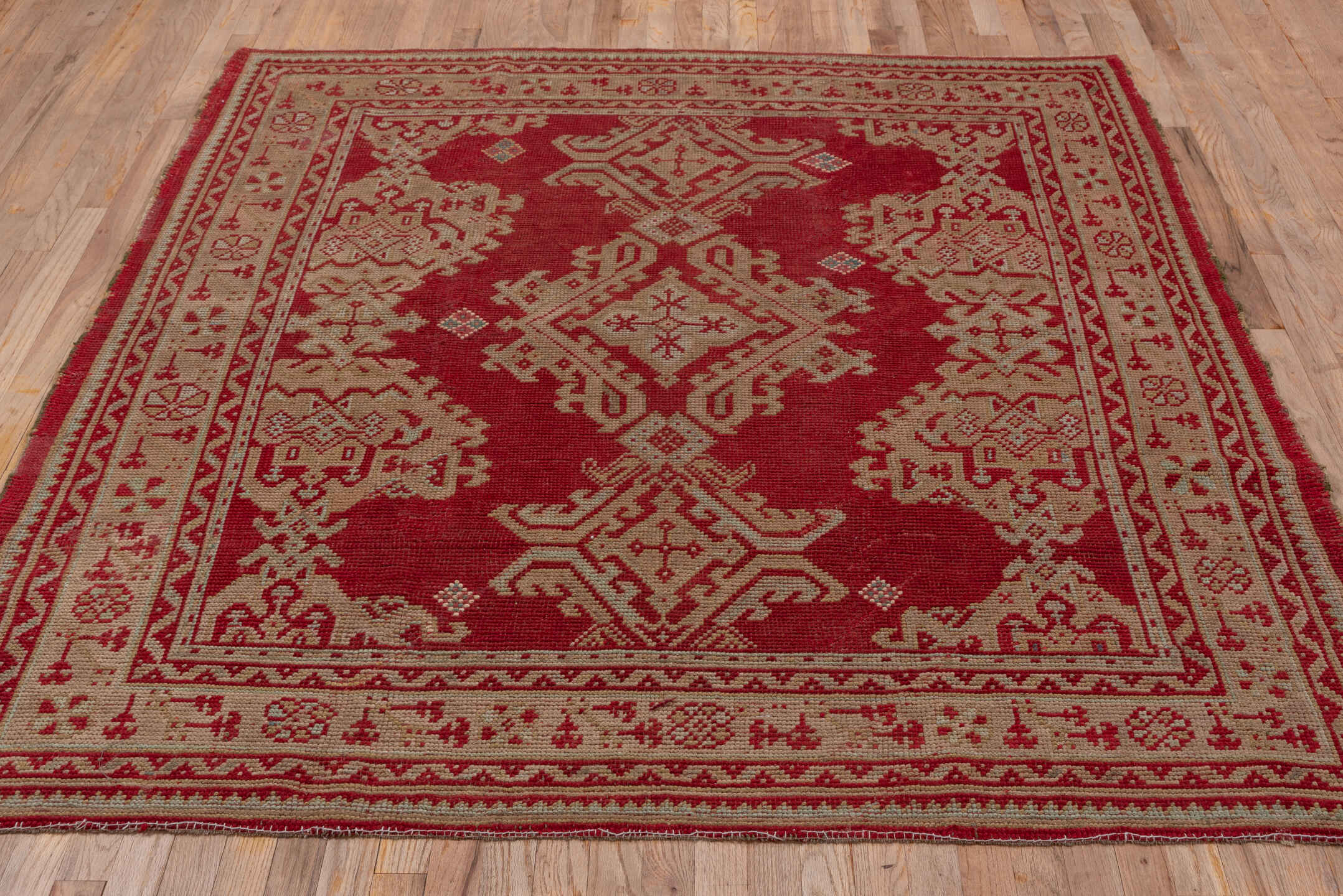 6' x 6' one-of-a-kind handmade antique Oushak rug. Color palette: crimson, ivory, rust, sky_blue, red, terracotta, brown