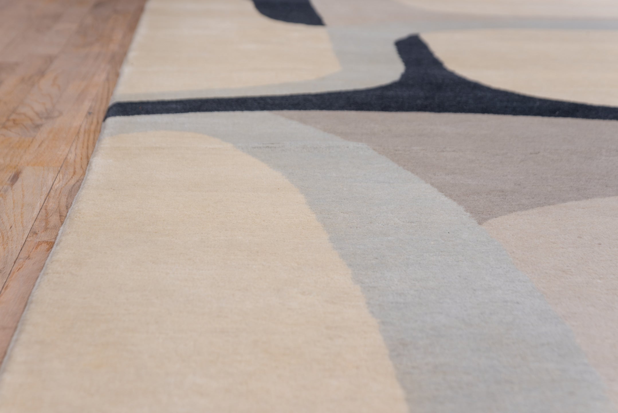 12' x 13' one-of-a-kind handmade vintage Art Deco oversize rug. Color palette: black, blue, brown, dark gray, gray