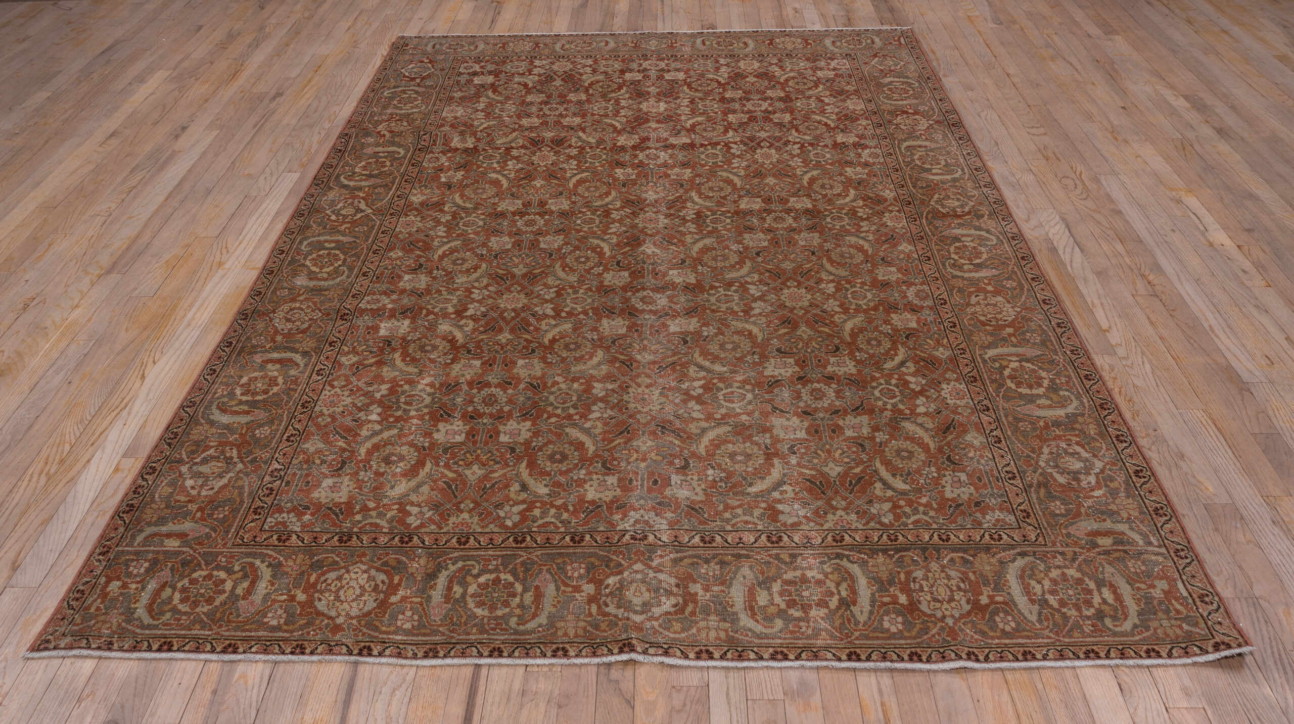 6' x 10' one-of-a-kind handmade antique Tabriz large size rug. Color palette: terra cotta, rust, slate, ivory, taupe, camel