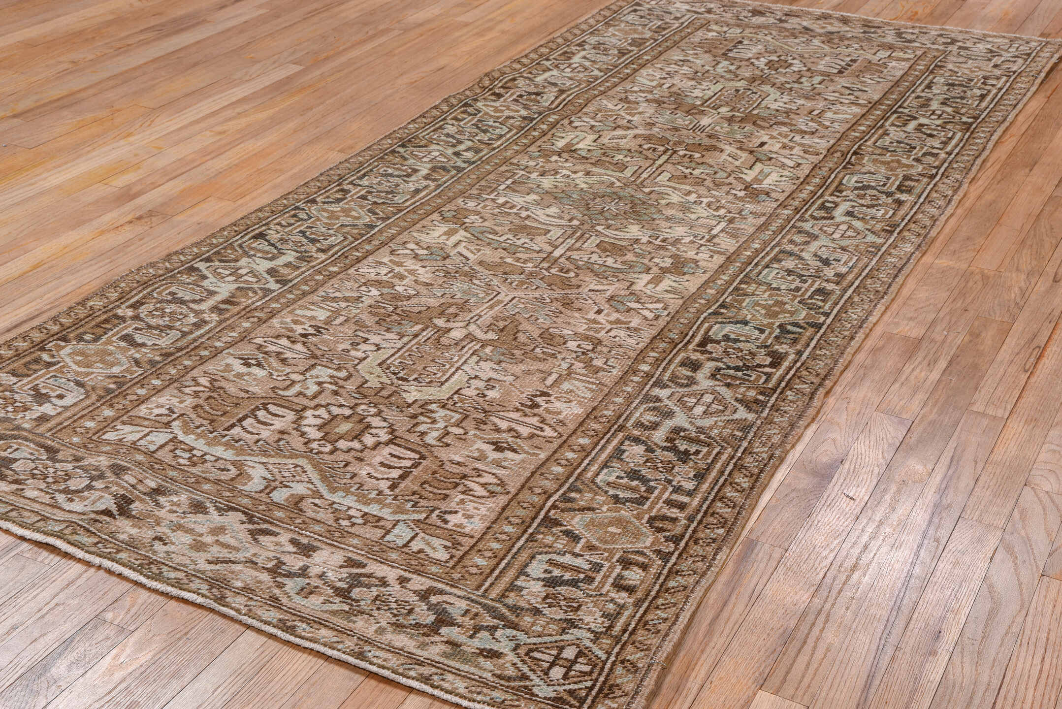 3' x 8' one-of-a-kind handmade antique Heriz runner rug. Color palette: taupe, brown, camel, ivory, beige, slate, gray
