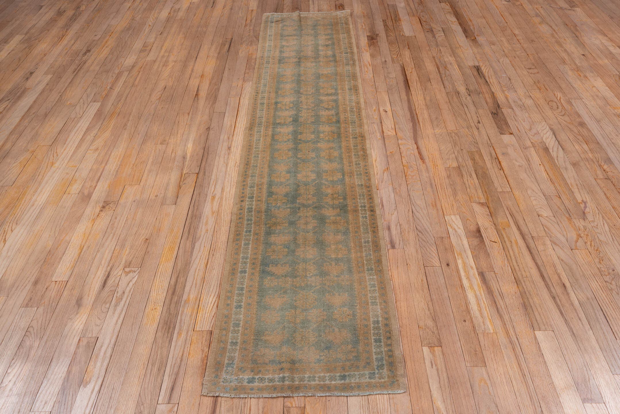 1' x 9' one-of-a-kind handmade antique Oushak rug. Color palette: camel, taupe, slate, ivory, sage, beige, gray, green