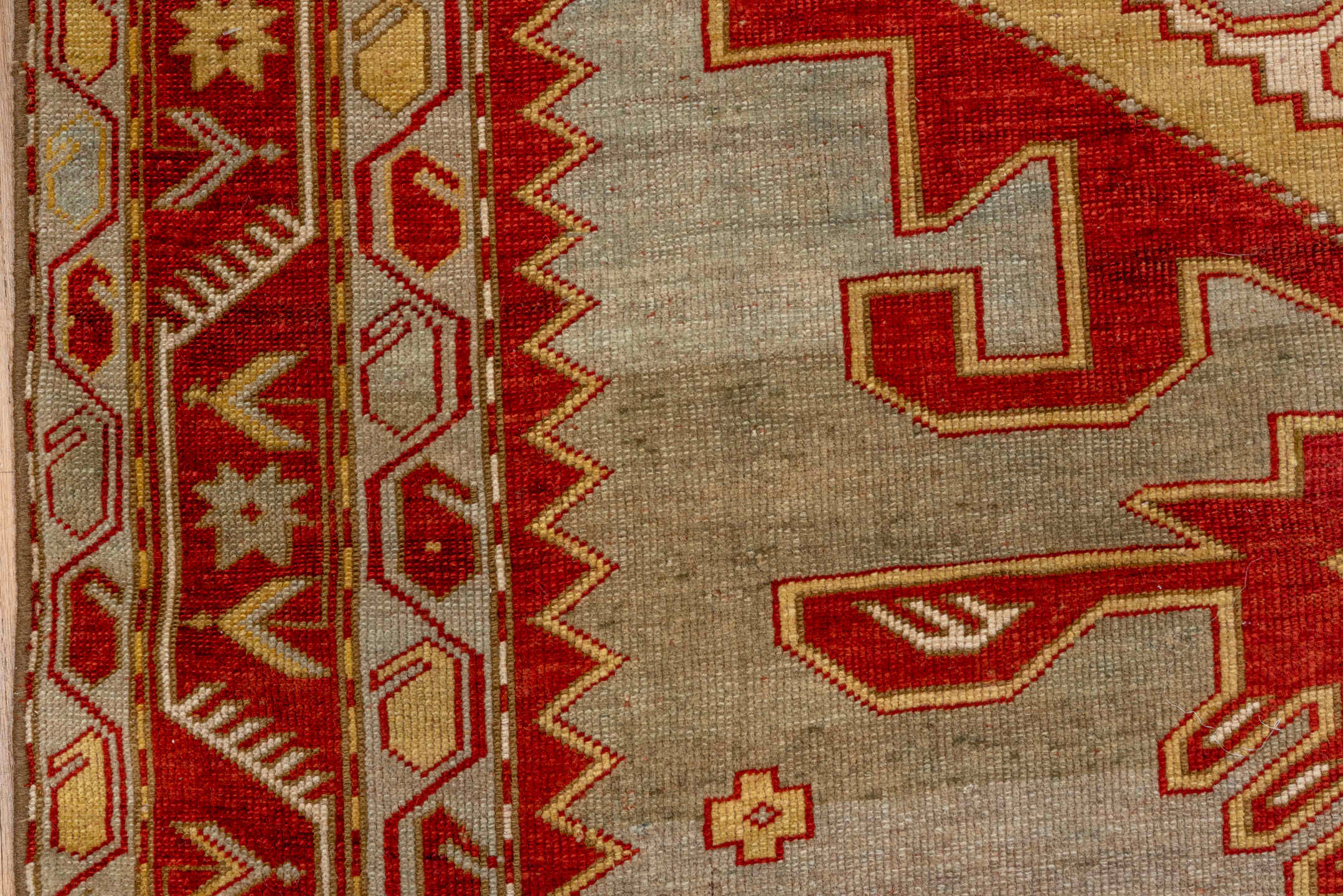 4' x 6' one-of-a-kind handmade antique Caucasian rug. Color palette: ivory, rust, crimson, camel, gold, taupe, terracotta