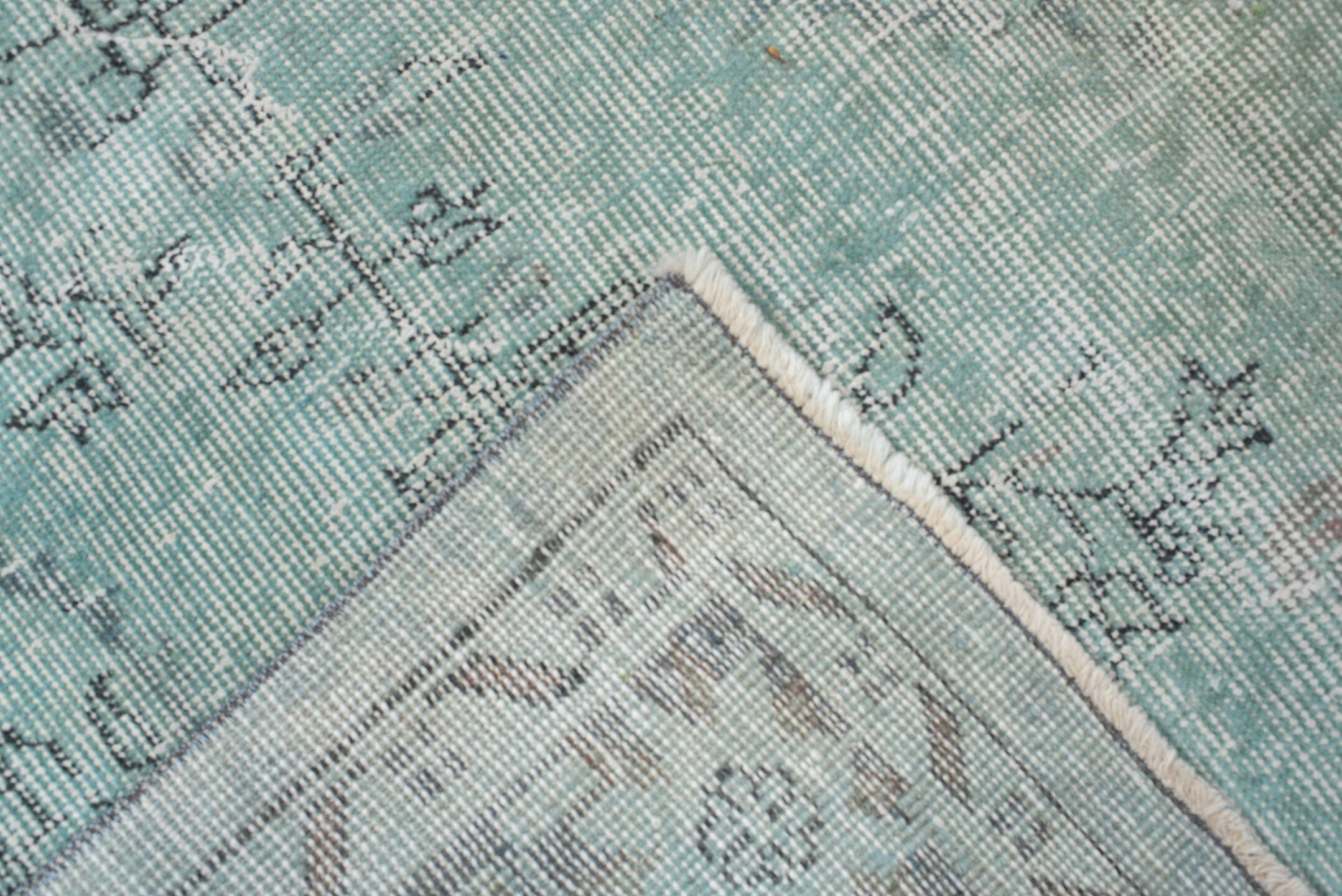 5' x 9' one-of-a-kind handmade vintage Sparta medium size rug. Color palette: ivory, pale blue, sky blue, taupe, soft gray