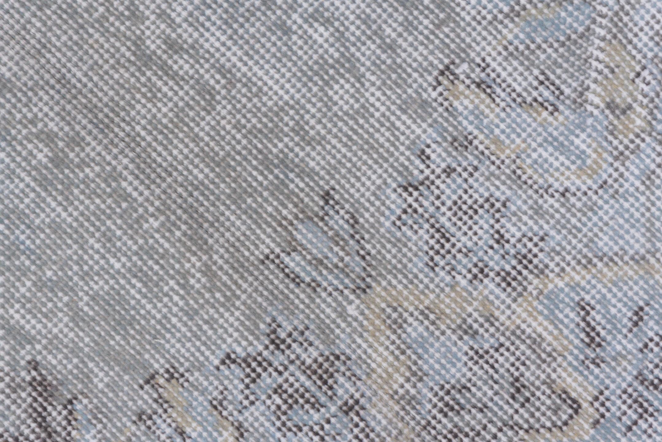 5' x 10' one-of-a-kind handmade vintage Sparta medium size rug. Color palette: ivory, taupe, beige, stone, light gray, gray