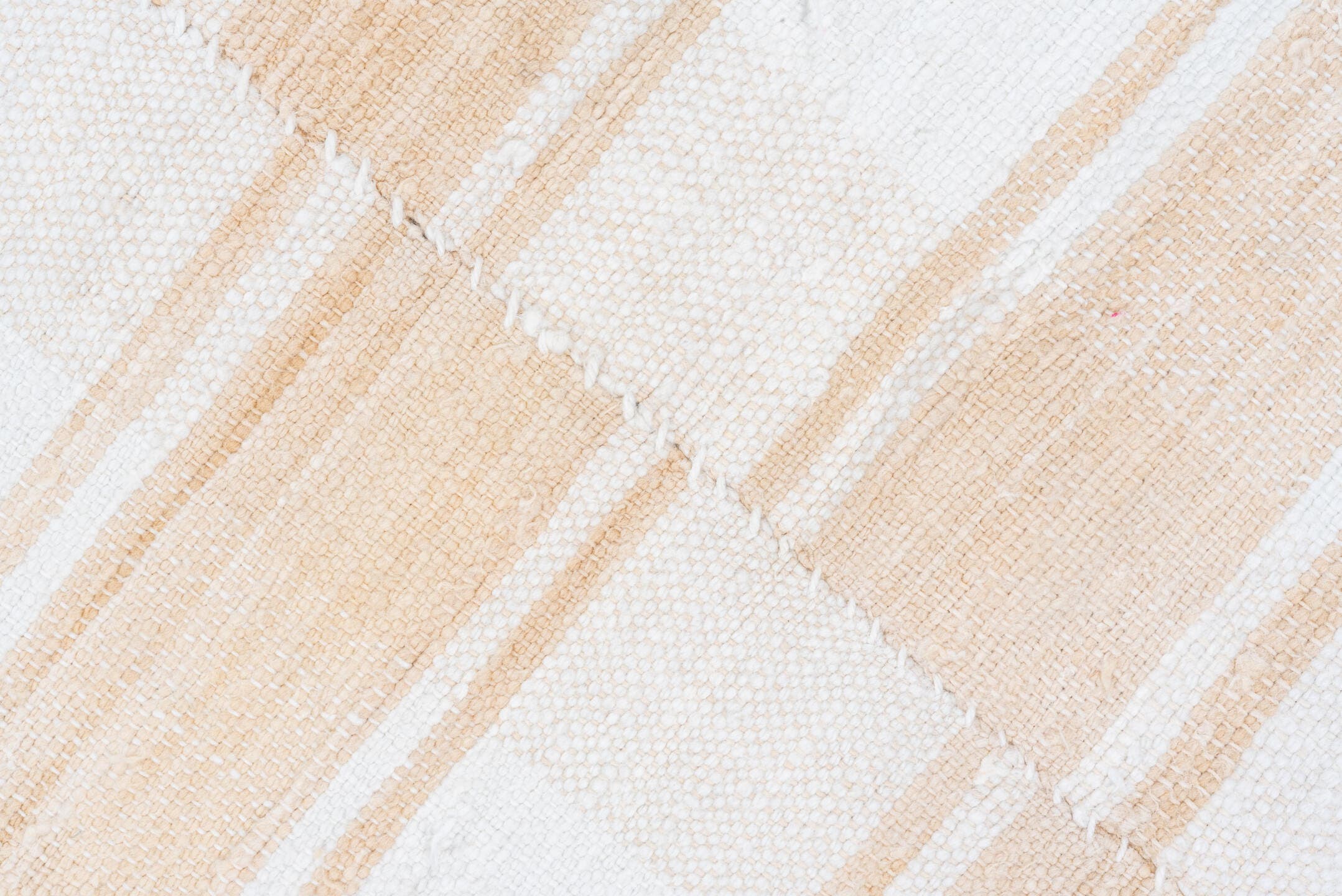 5' x 8' one-of-a-kind handmade antique Textile medium size rug. Color palette: ivory, cream, camel, sand, beige