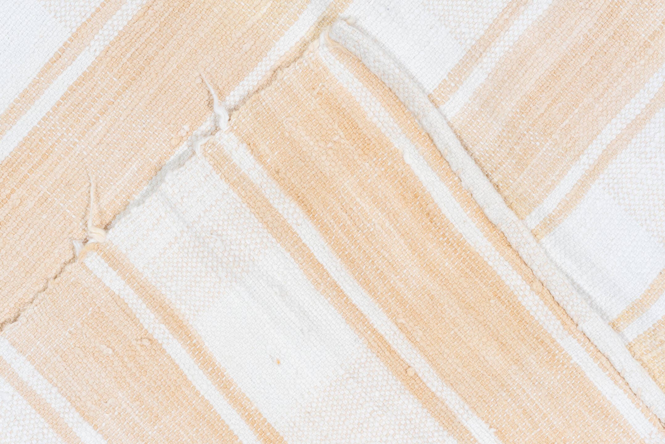 5' x 8' one-of-a-kind handmade antique Textile medium size rug. Color palette: ivory, cream, camel, sand, beige