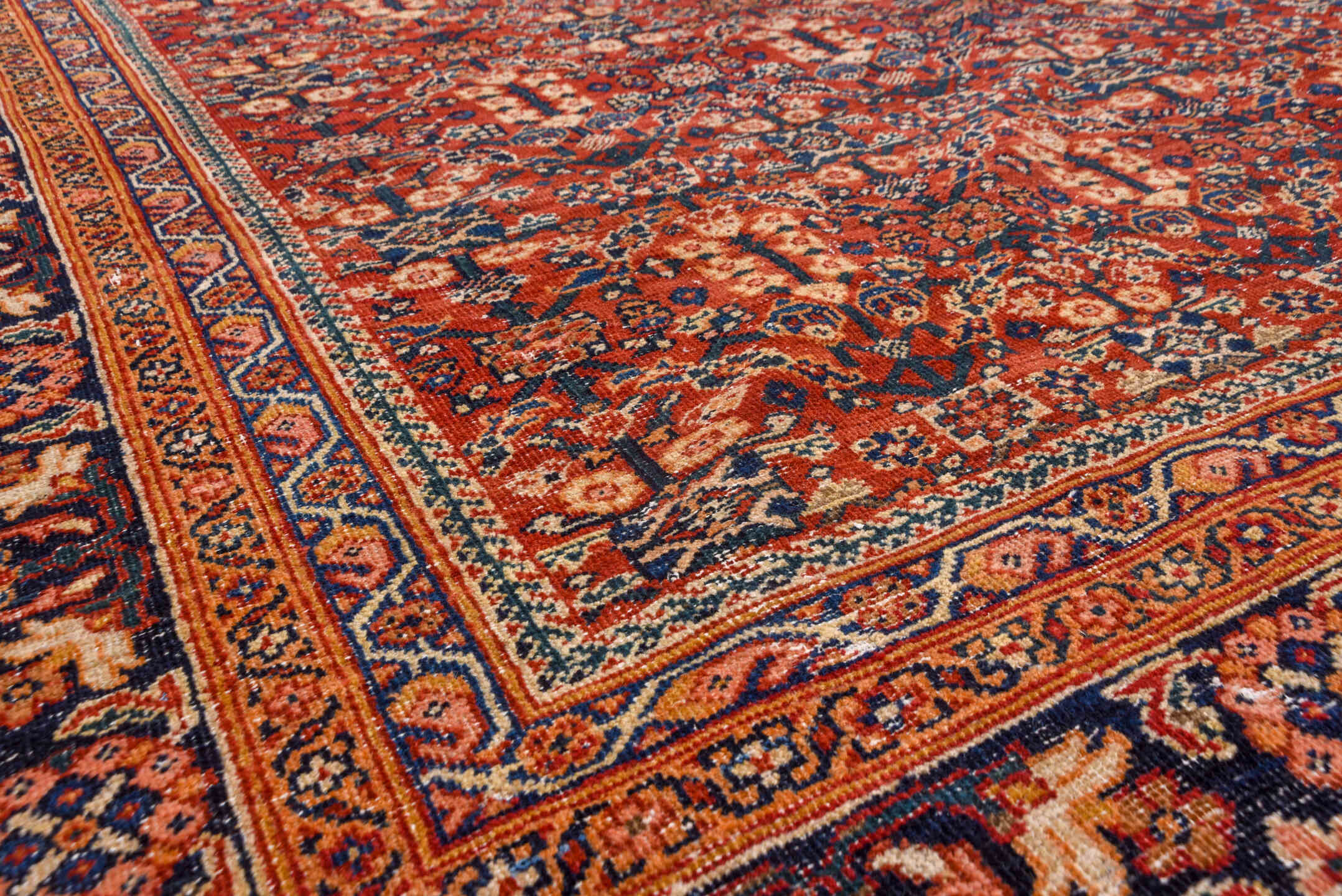 10' x 13' one-of-a-kind handmade vintage Mahal large size rug. Color palette: rust, navy, ivory, terra cotta, camel