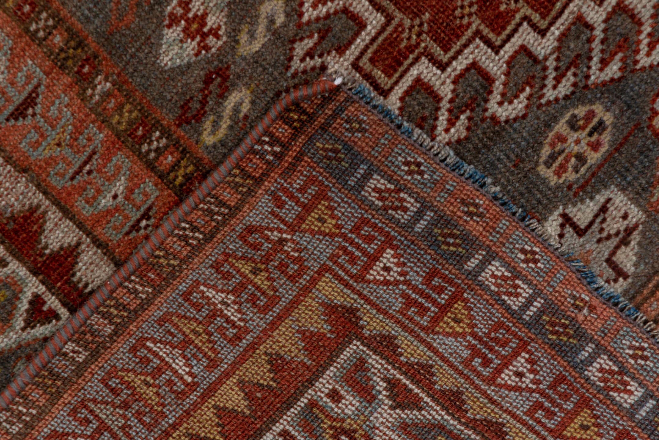 6' x 12' one-of-a-kind handmade antique Shiraz large size rug. Color palette: rust, blue_gray, ivory, taupe, terra_cotta