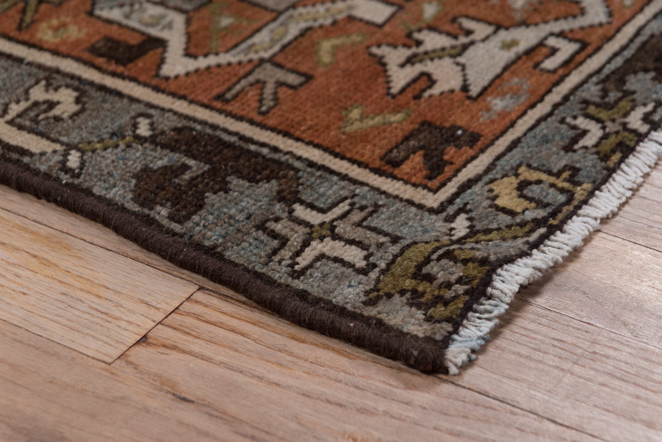 4' x 6' one-of-a-kind handmade antique Baktiary rug. Color palette: sky blue, rust, ivory, brown, camel, slate, taupe, olive