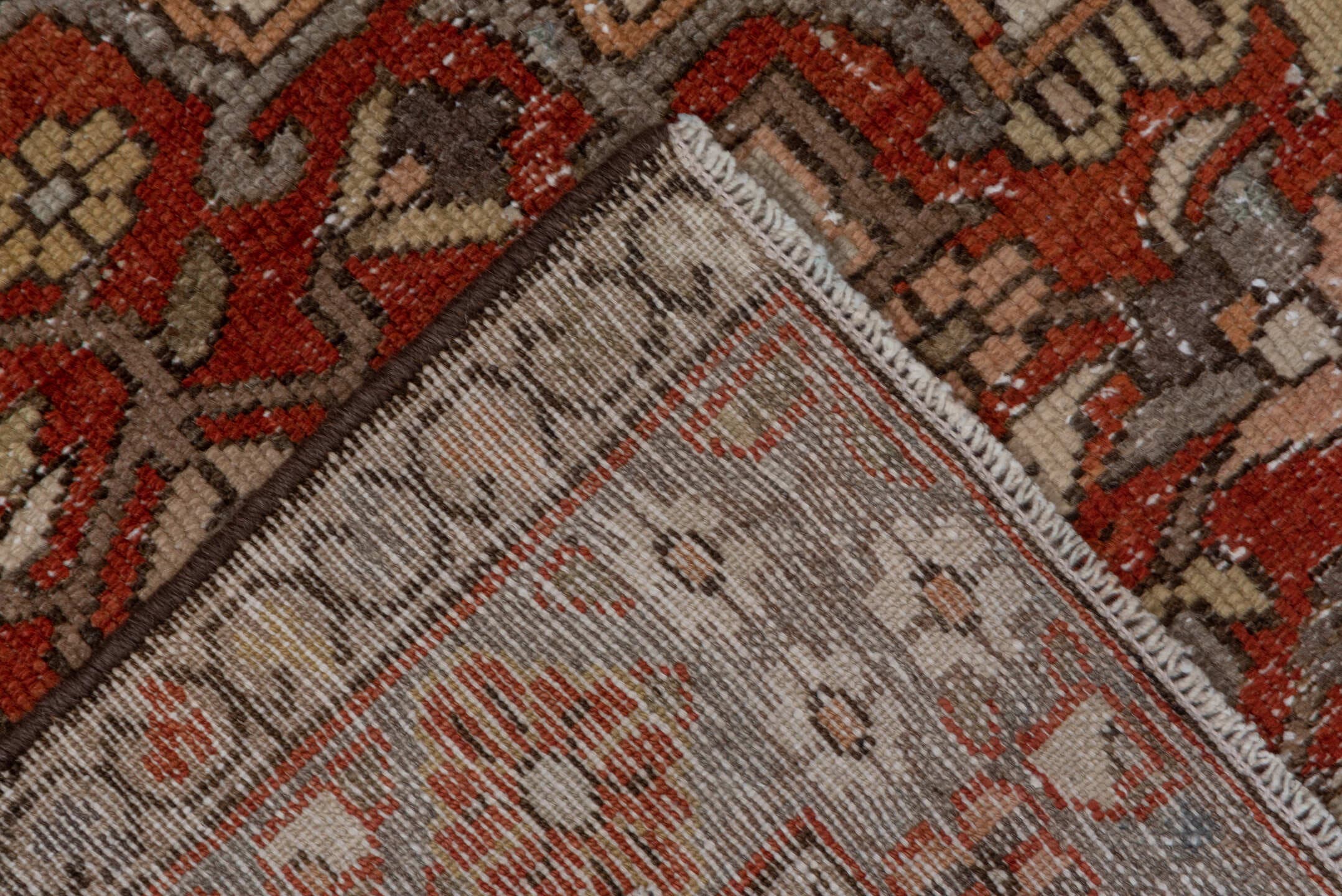 4' x 6' one-of-a-kind handmade antique Baktiary small size rug. Color palette: ivory, rust, slate, taupe, terra cotta, brown