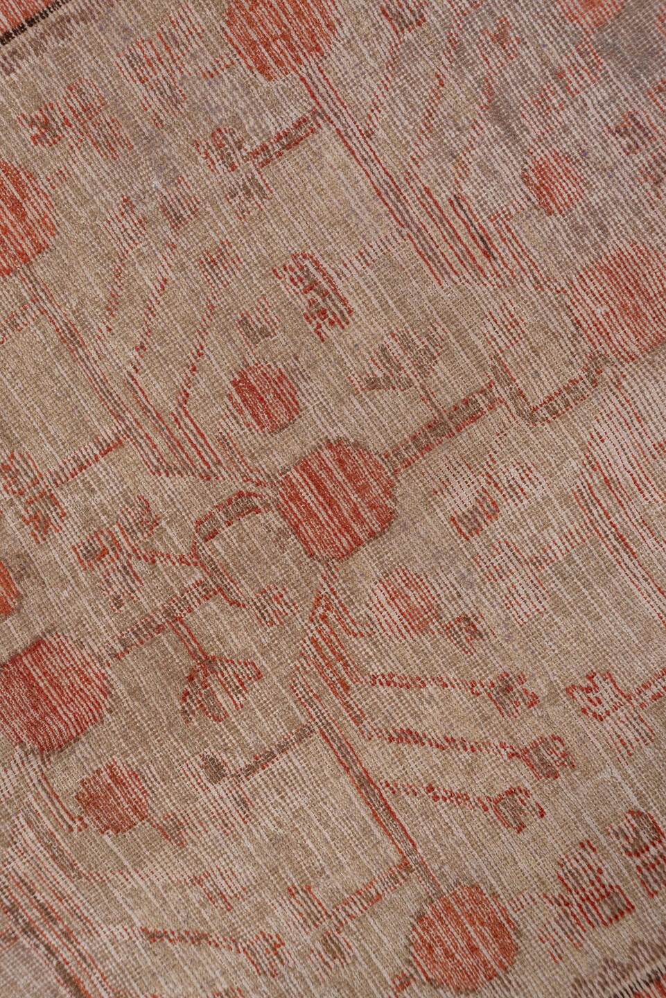 5' x 11' one-of-a-kind handmade antique Khotan rug. Color palette: ivory, terra cotta, taupe, charcoal, rose, camel
