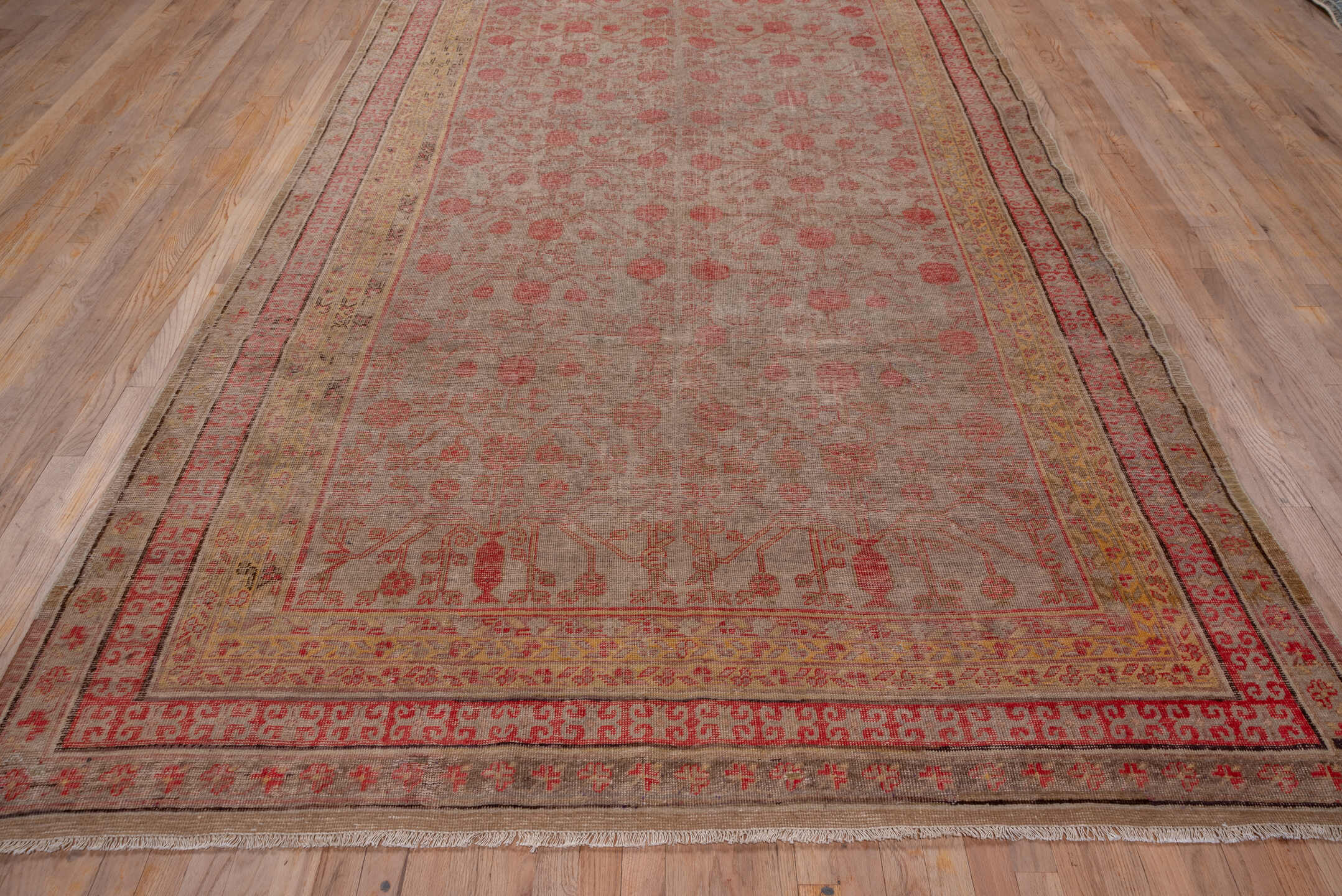 6' x 13' one-of-a-kind handmade antique Khotan large size rug. Color palette: taupe, rose, coral, camel, ivory, sienna