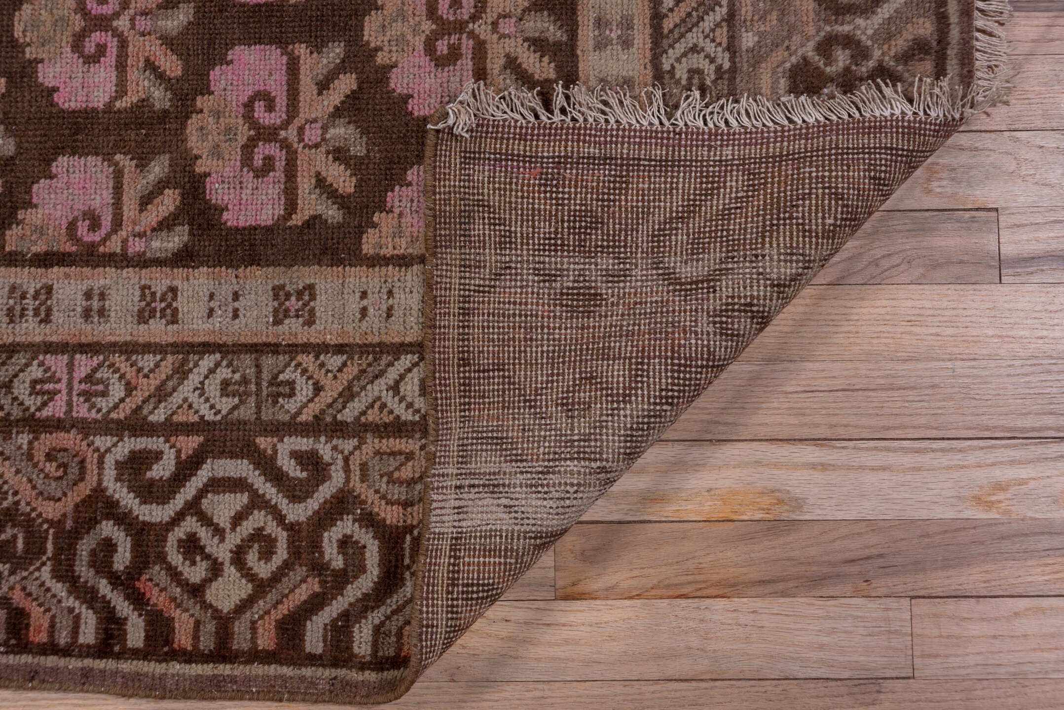 4' x 9' one-of-a-kind handmade vintage Khotan rug. Color palette: brown, rose, taupe, ivory, dusty pink, charcoal, camel