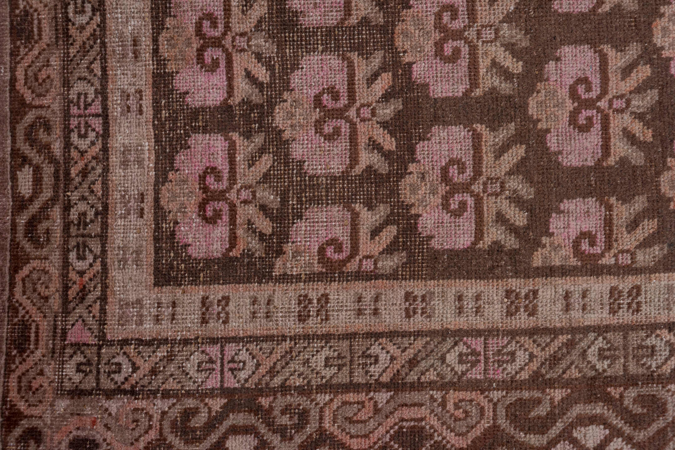 4' x 9' one-of-a-kind handmade vintage Khotan rug. Color palette: brown, rose, taupe, ivory, dusty pink, charcoal, camel