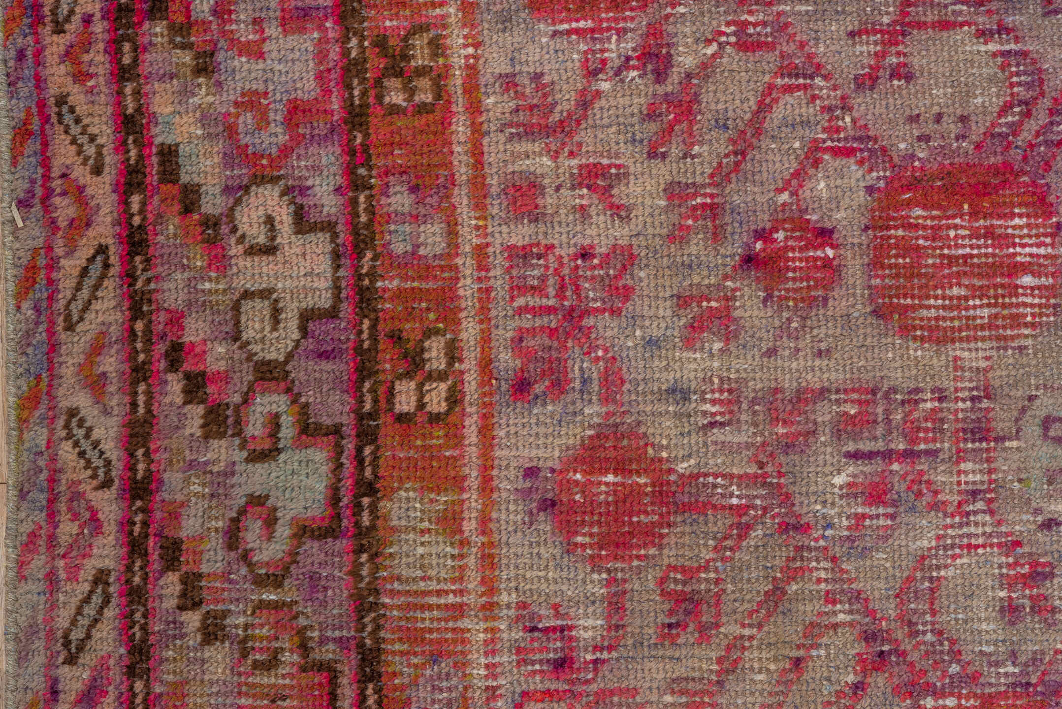5' x 9' one-of-a-kind handmade antique Khotan medium size rug. Color palette: pink, rose, crimson, ivory, lavender, burgundy