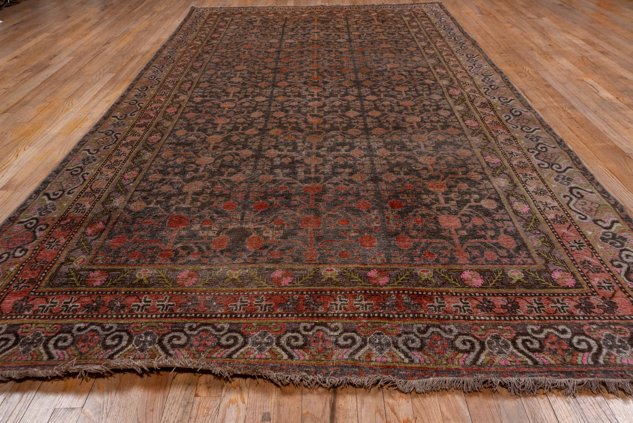 6' x 12' one-of-a-kind handmade antique Khotan large size rug. Color palette: taupe, rose, charcoal, dusty pink, rust, mauve