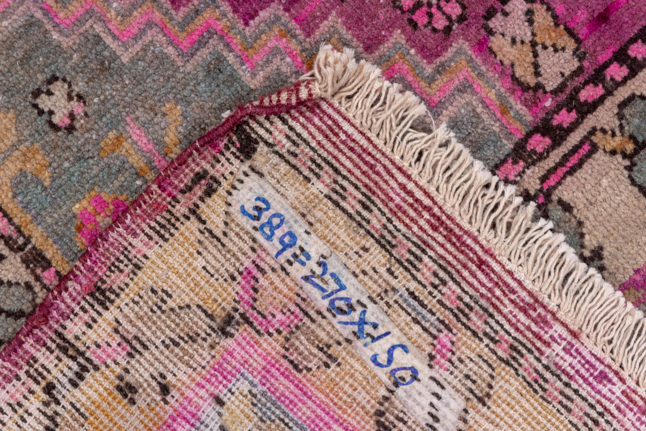 4' x 8' one-of-a-kind handmade antique Khotan rug. Color palette: gray, rose, magenta, taupe, mauve, charcoal, ivory, pink