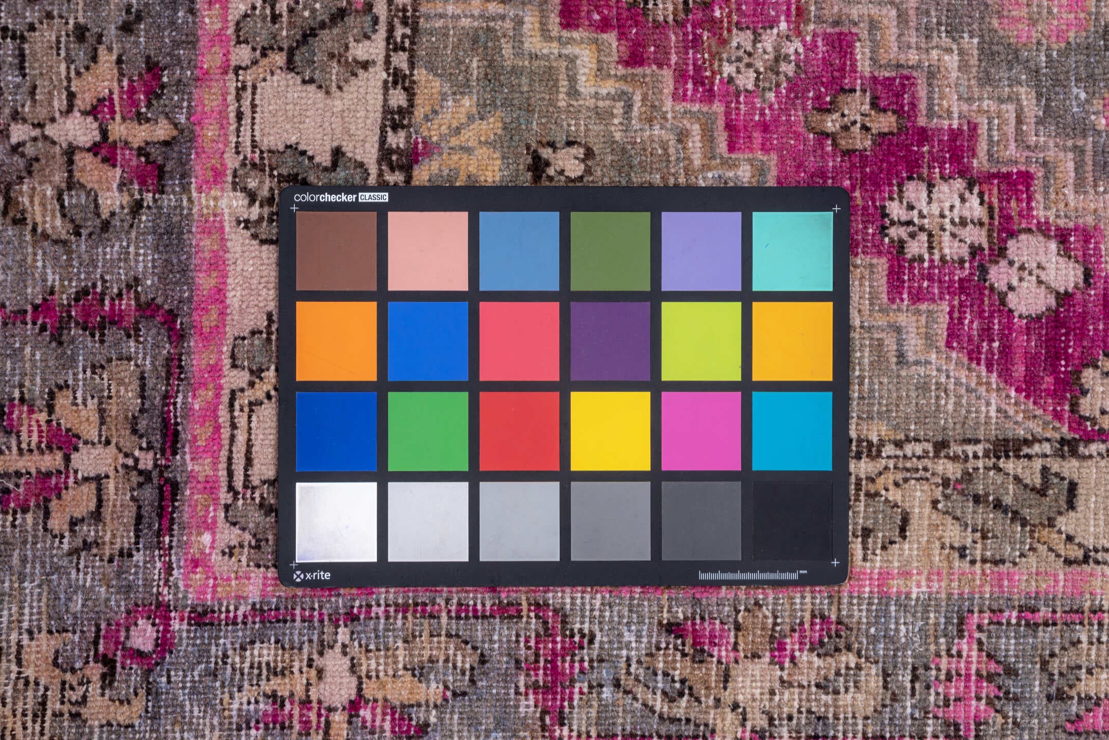 4' x 8' one-of-a-kind handmade antique Khotan rug. Color palette: gray, rose, magenta, taupe, mauve, charcoal, ivory, pink
