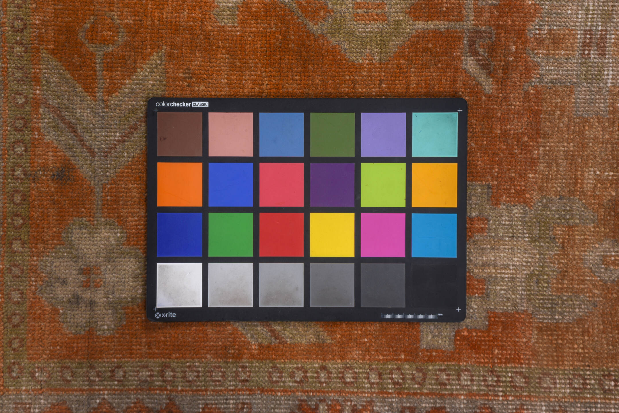 5' x 9' one-of-a-kind handmade vintage Khotan medium size rug. Color palette: brown, light gray, off-white, pink