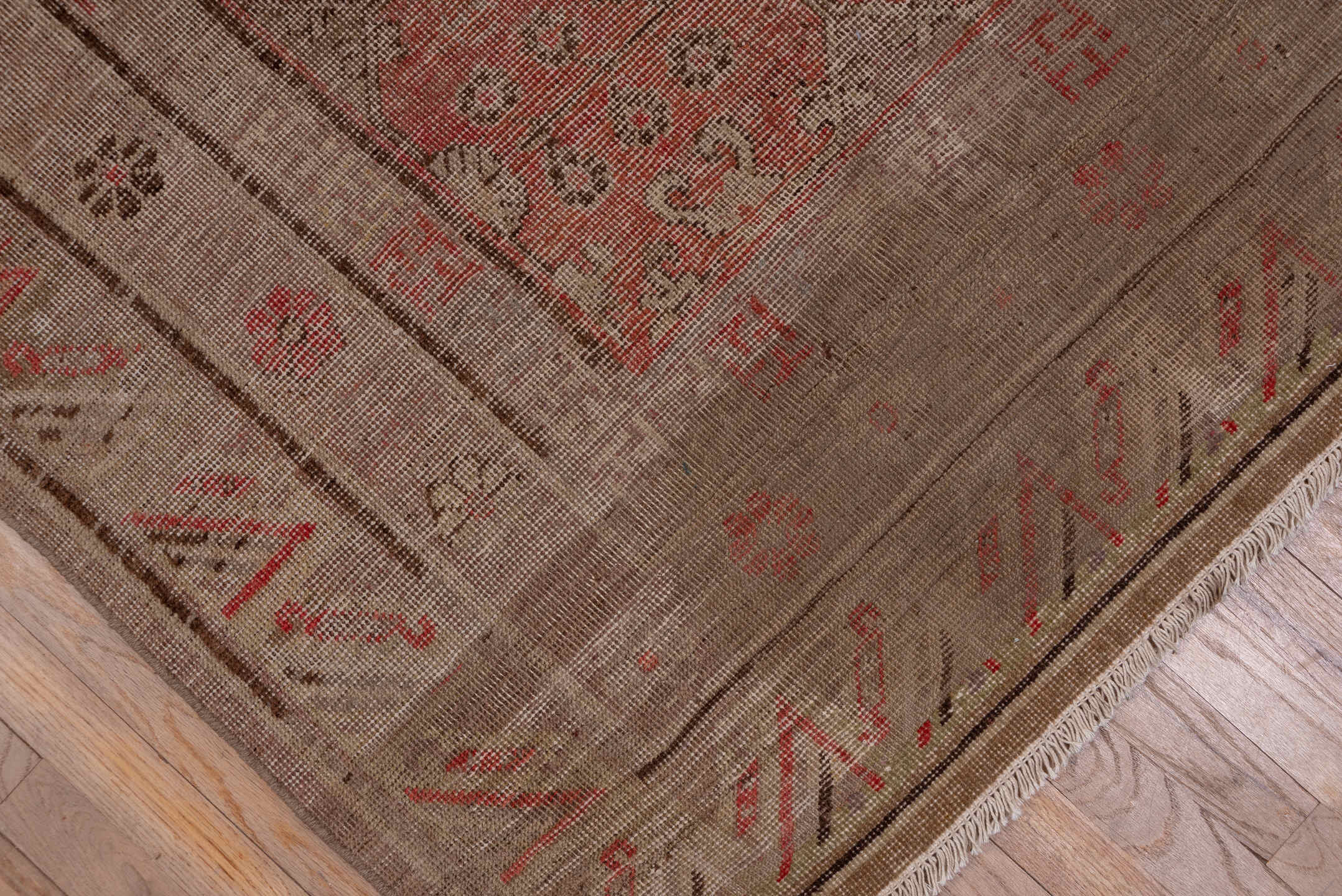 6' x 12' one-of-a-kind handmade antique Khotan large size rug. Color palette: taupe, coral, rose, camel, brown, charcoal