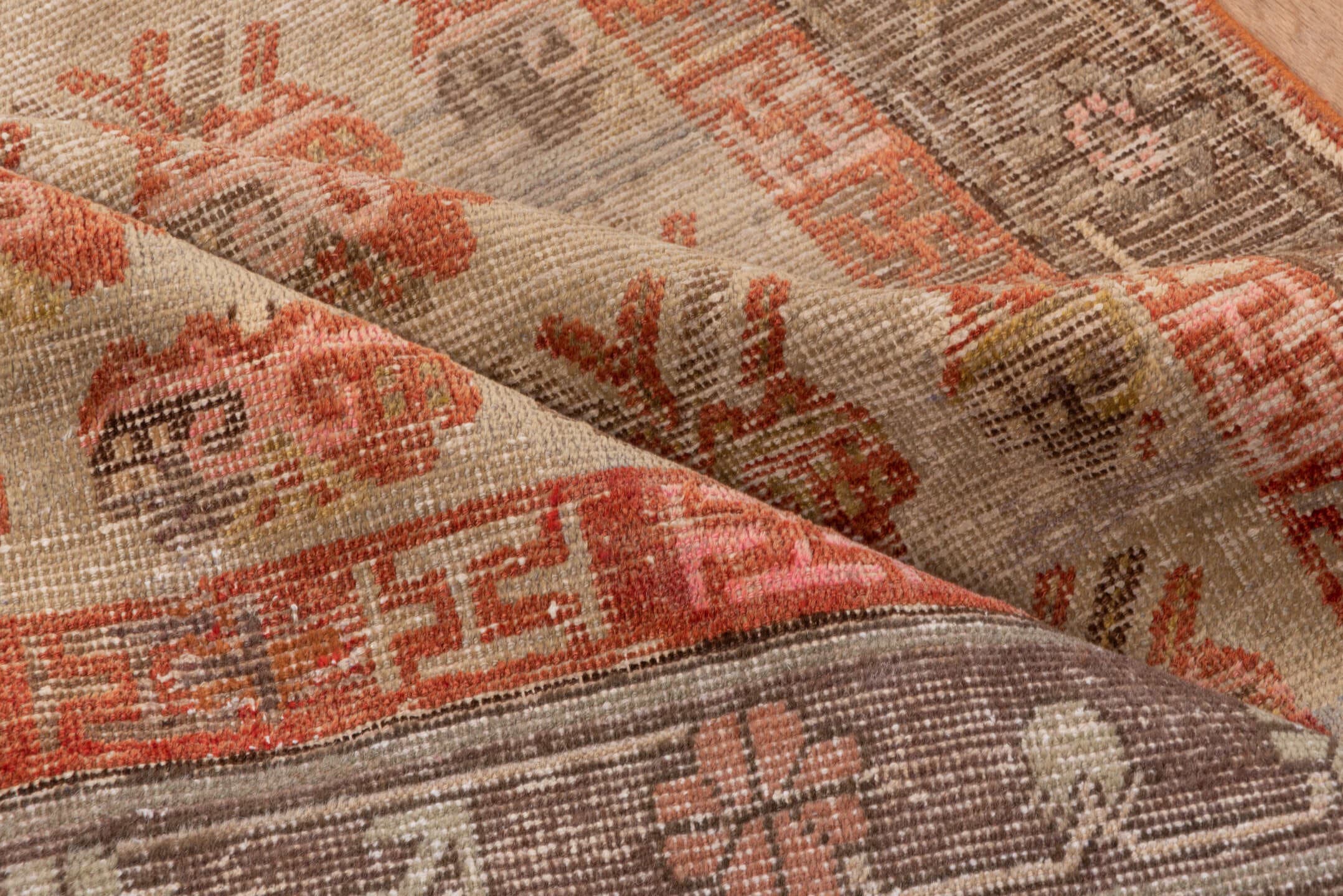 4' x 7' one-of-a-kind handmade antique Khotan rug. Color palette: ivory, taupe, rust, brown, rose, camel, beige, gray