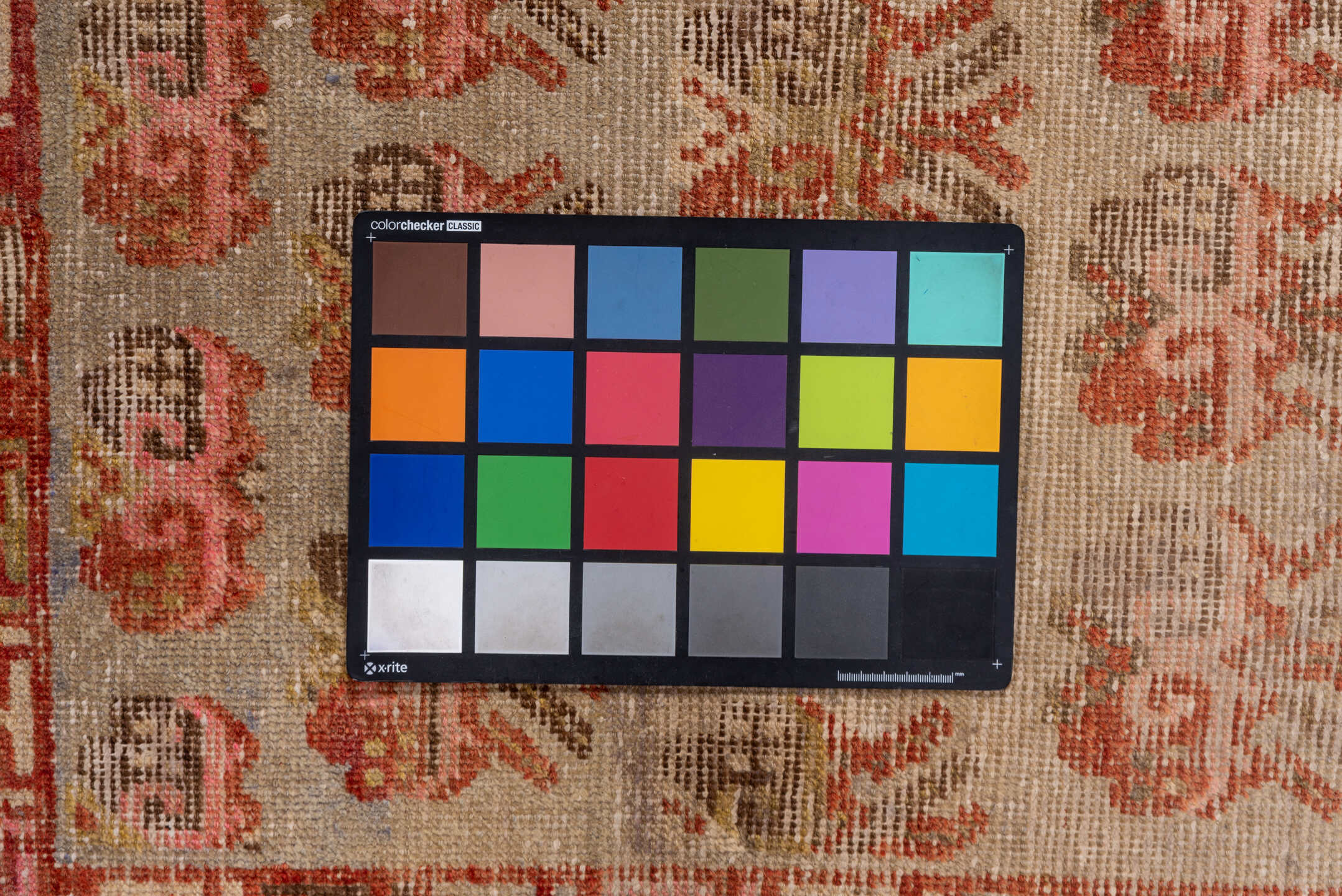 4' x 7' one-of-a-kind handmade vintage Khotan rug. Color palette: brown, off-white, orange, pink