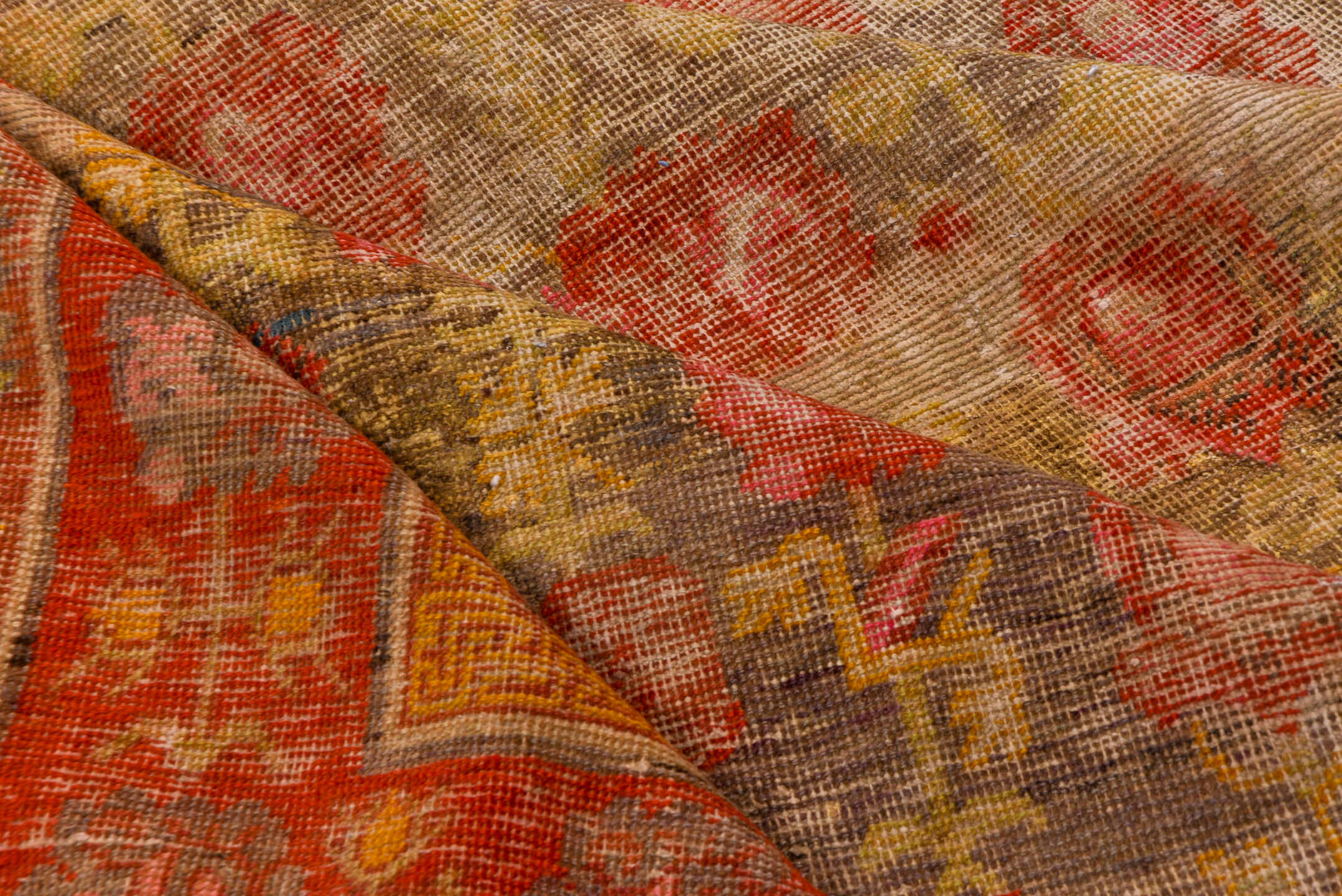 6' x 12' one-of-a-kind handmade antique Khotan large size rug. Color palette: taupe, rust, coral, terracotta, gold, rose