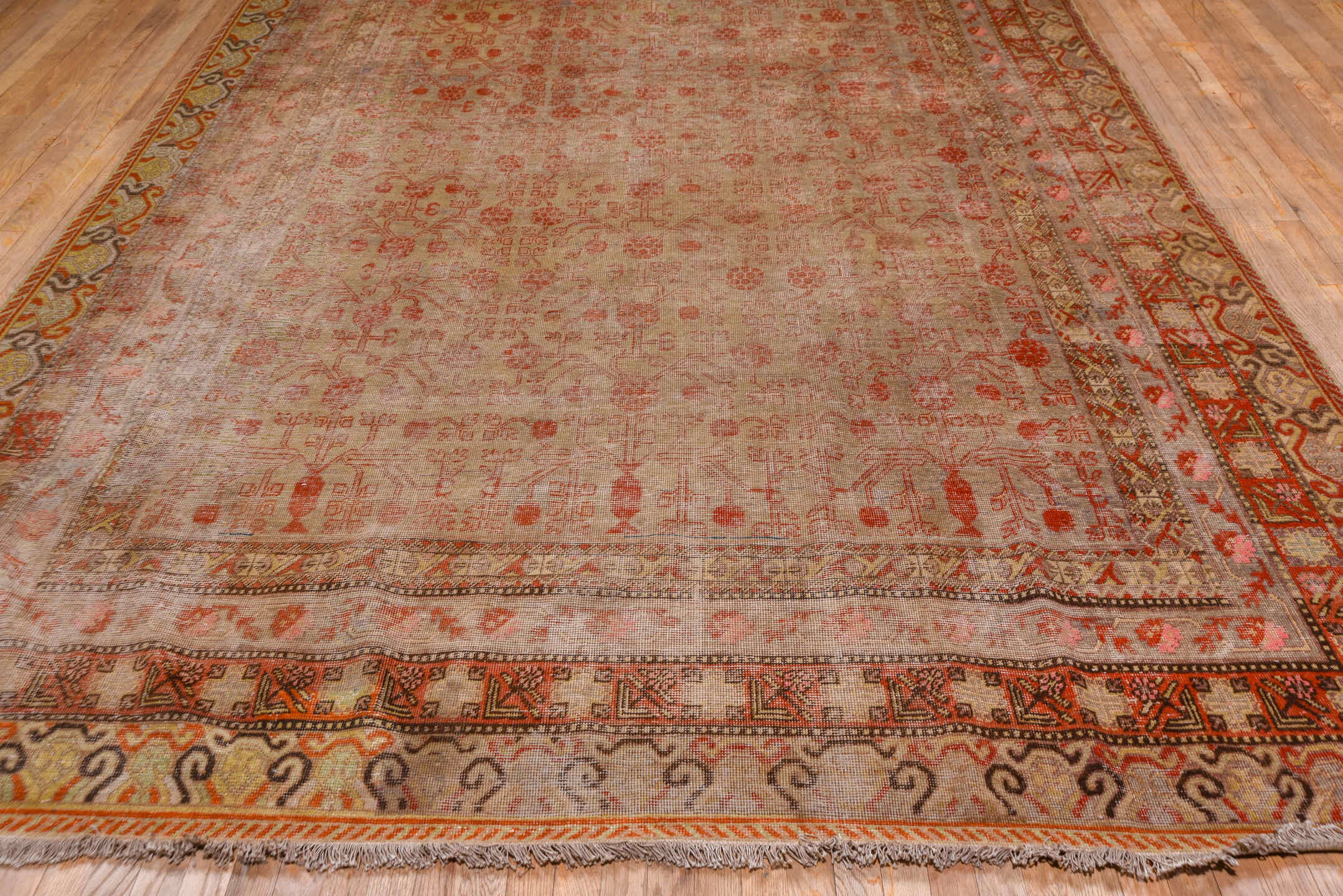 8' x 15' one-of-a-kind handmade vintage Khotan rug. Color palette: brown, pink, red