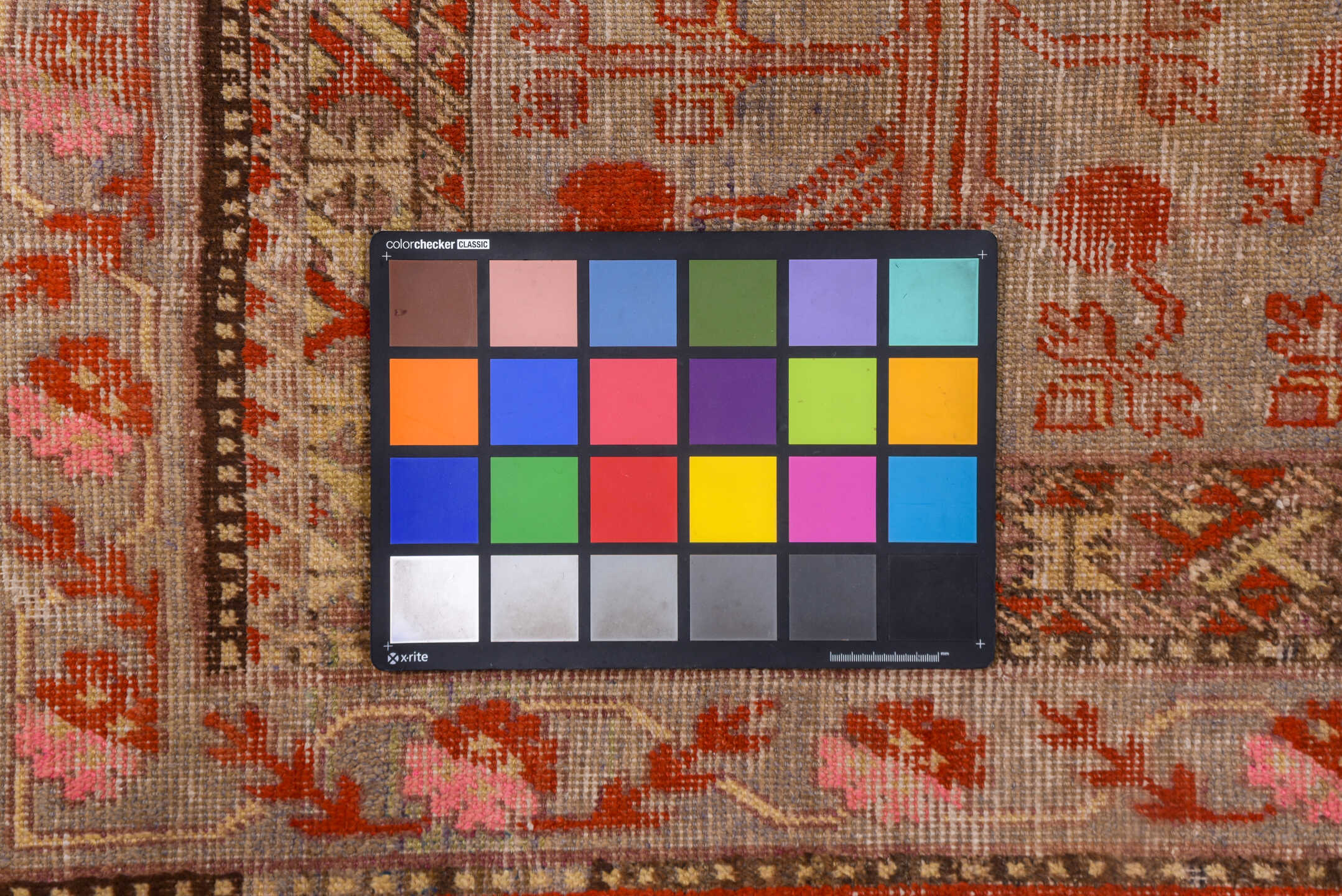 8' x 15' one-of-a-kind handmade vintage Khotan rug. Color palette: brown, pink, red