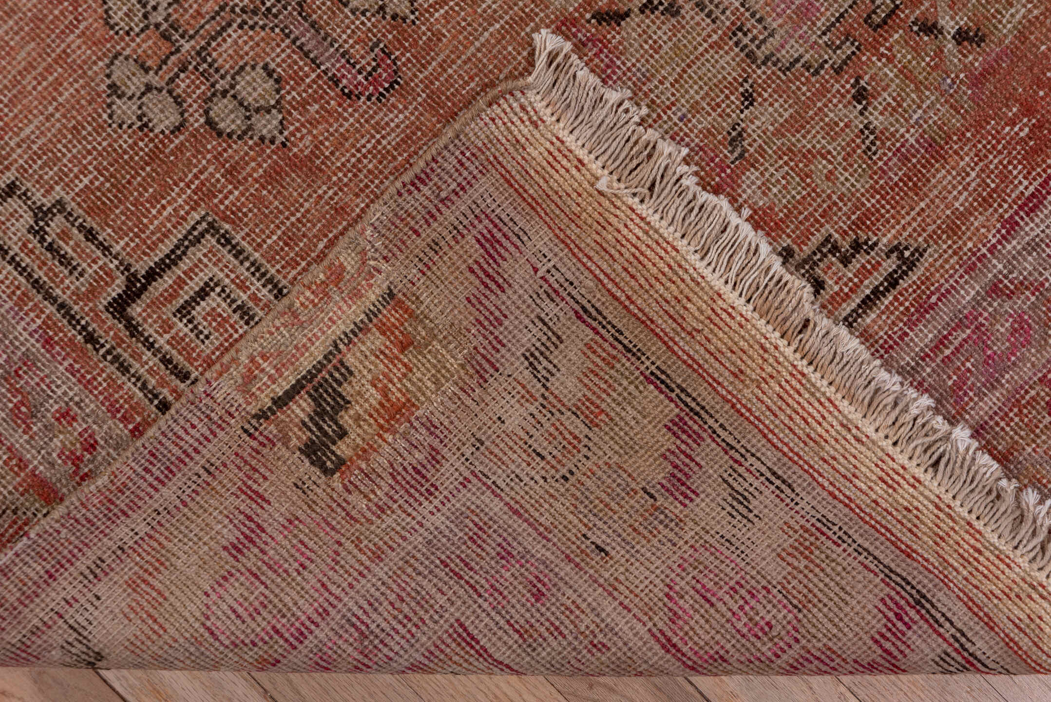 4' x 9' one-of-a-kind handmade vintage Khotan runner rug. Color palette: brown, gray, pink, red