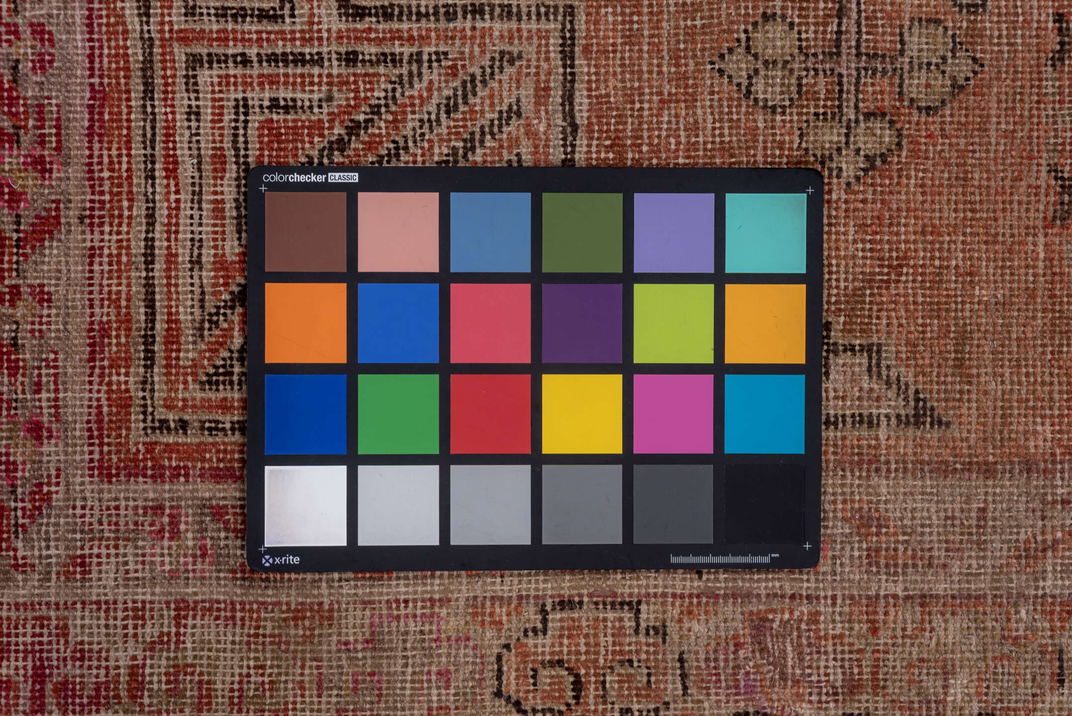 4' x 9' one-of-a-kind handmade vintage Khotan runner rug. Color palette: brown, gray, pink, red