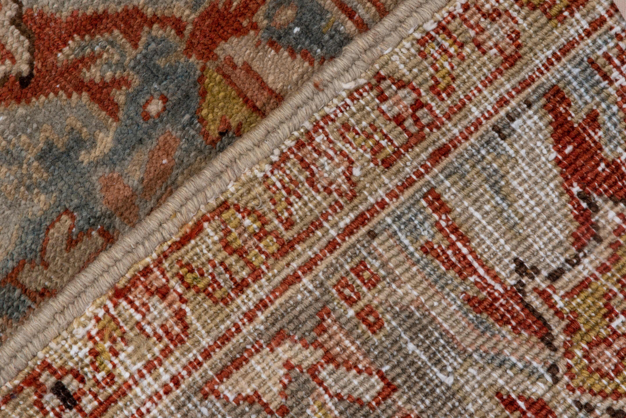 7' x 11' one-of-a-kind handmade antique Heriz large size rug. Color palette: terra cotta, light blue, ivory, rust, sage