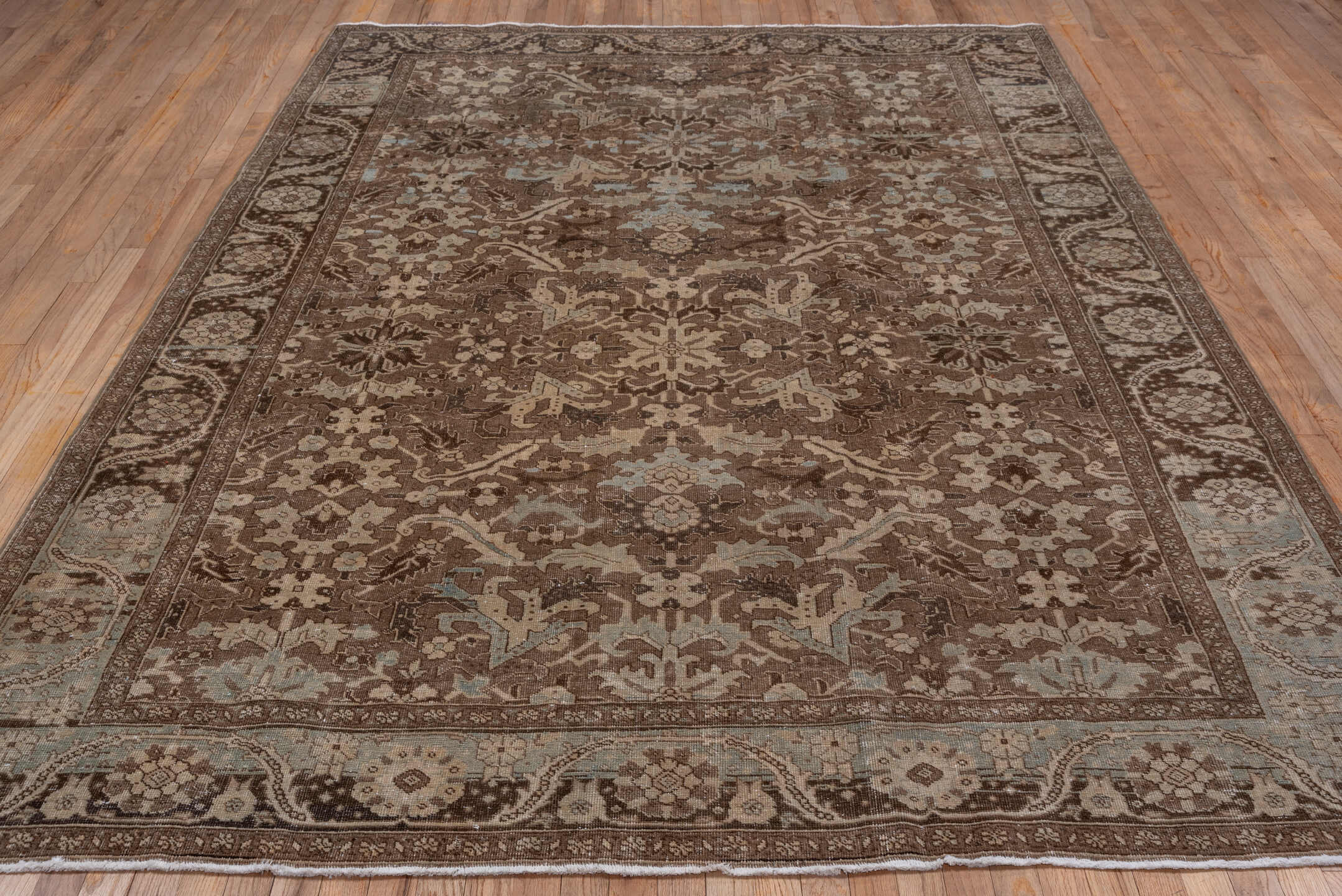 6' x 10' one-of-a-kind handmade vintage Heriz large size rug. Color palette: brown, gray, light gray, off-white, pink, snow