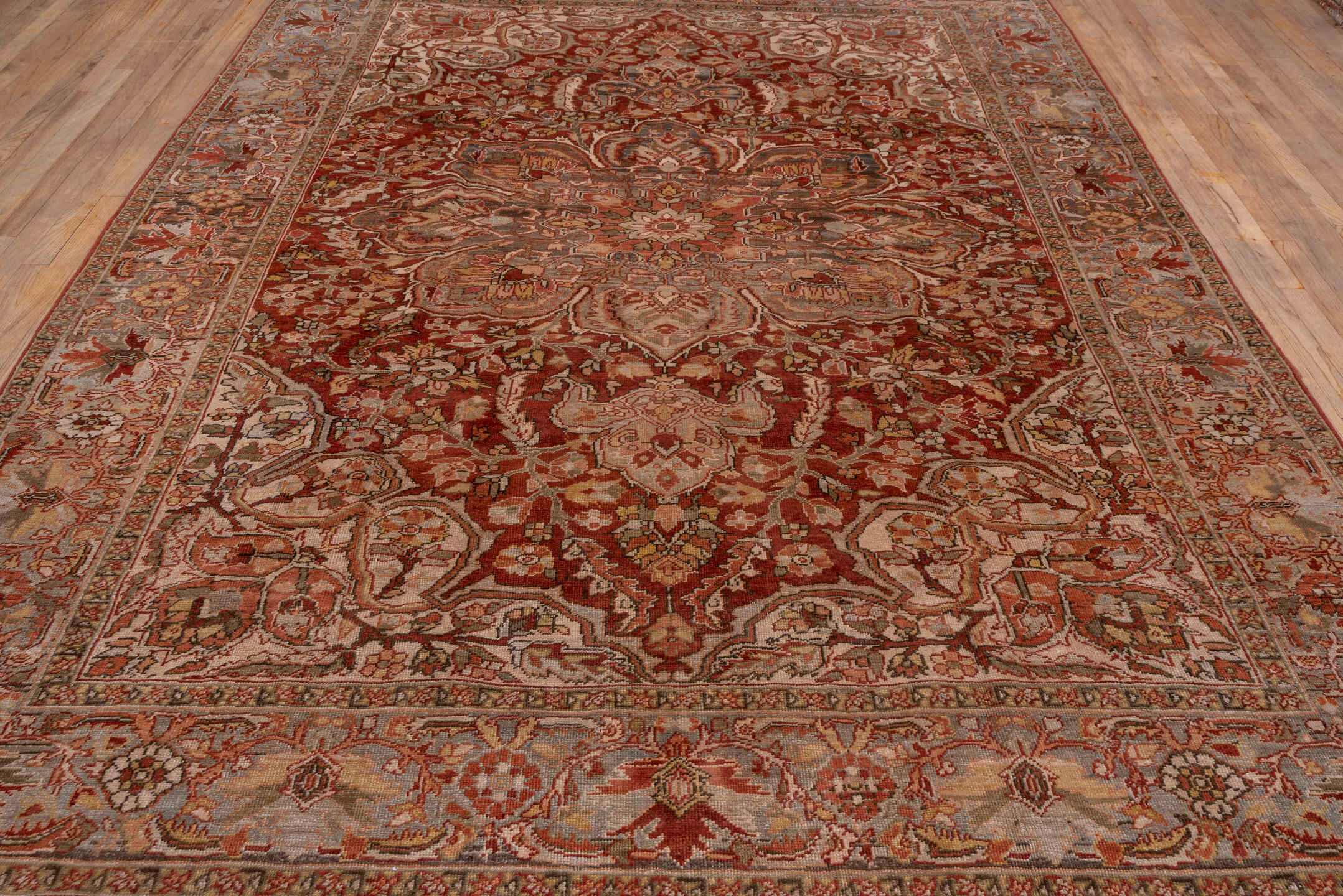 8' x 11' one-of-a-kind handmade antique Heriz large size rug. Color palette: rust, ivory, taupe, slate, terra cotta, camel