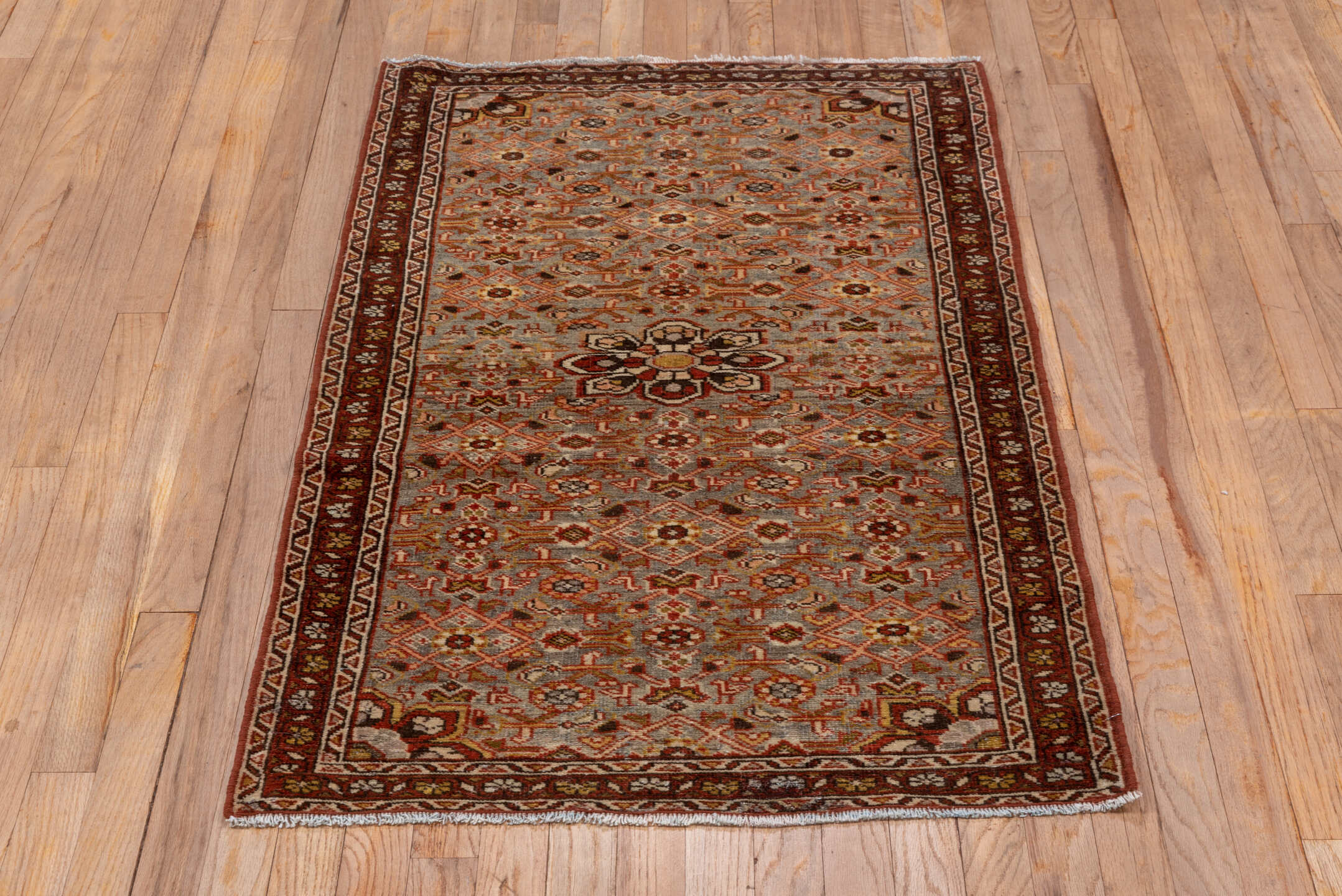2' x 4' one-of-a-kind handmade vintage Malayer small size rug. Color palette: brown, gray, light gray, off-white, pink
