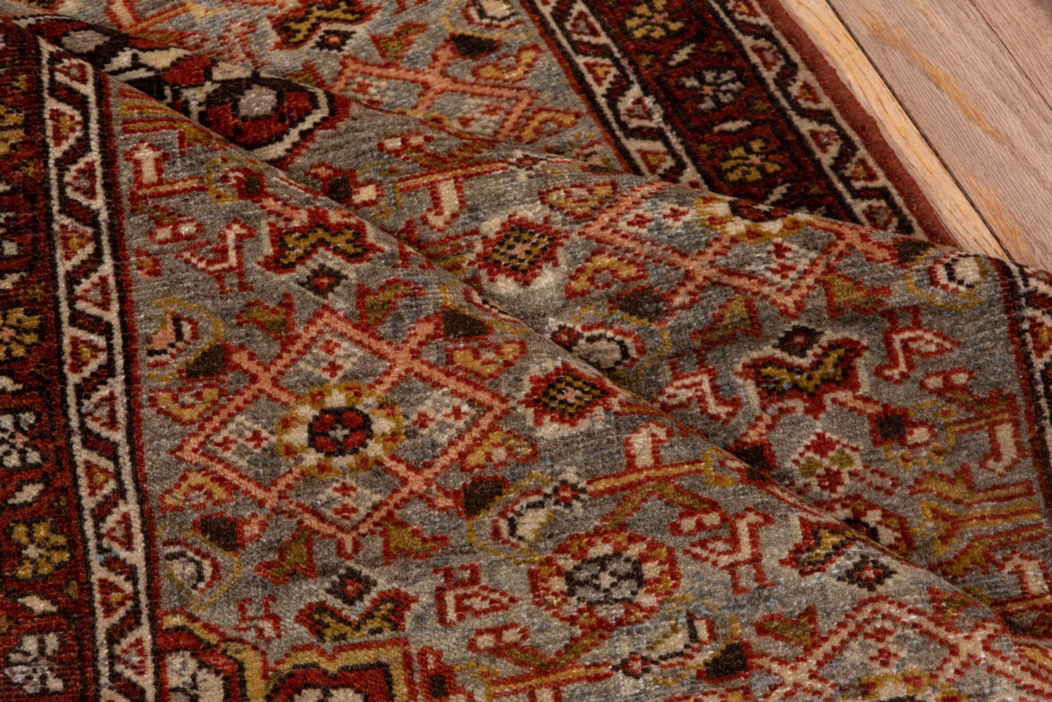 2' x 4' one-of-a-kind handmade antique Malayer small size rug. Color palette: rust, blue-gray, ivory, gold, brown, camel