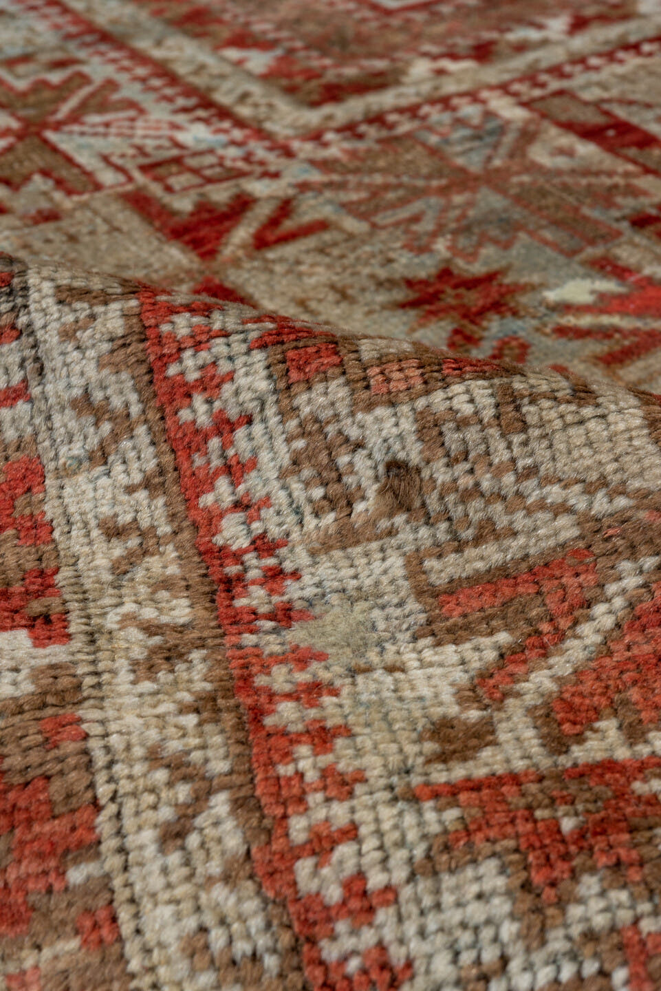 3' x 4' one-of-a-kind handmade antique Belouch small size rug. Color palette: rust, ivory, taupe, brown, terra cotta