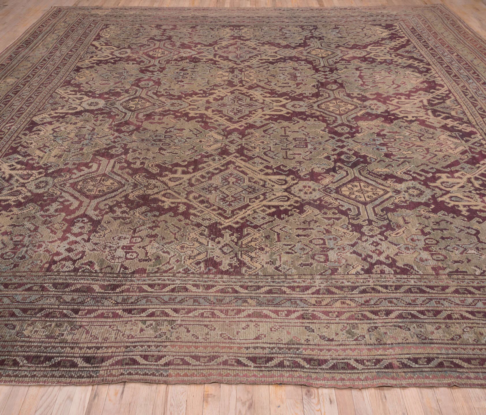 14' x 14' one-of-a-kind handmade antique Oushak oversize rug. Color palette: burgundy, ivory, taupe, sage, muted gold, rose