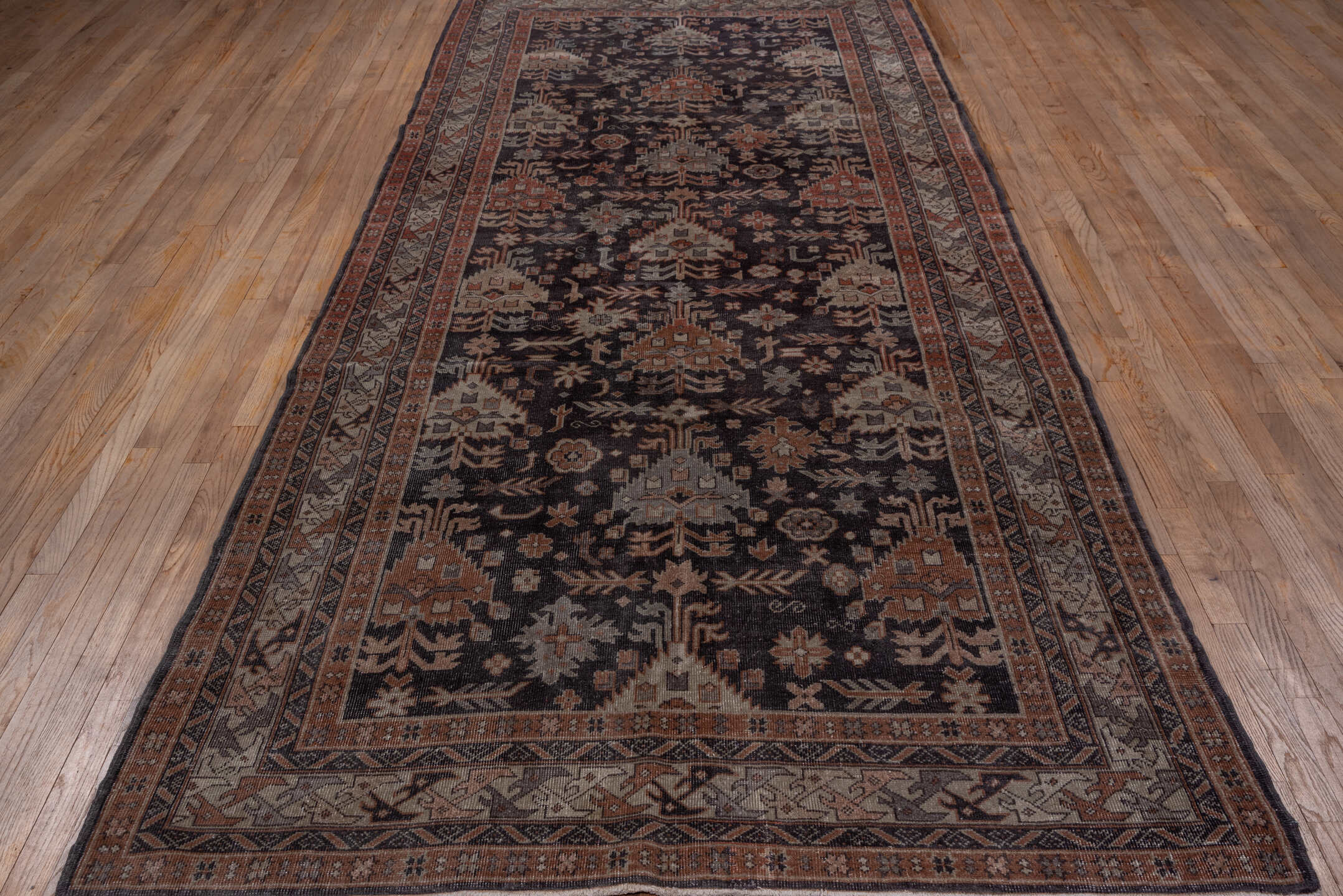 5' x 12' one-of-a-kind handmade vintage Sparta rug. Color palette: black, brown, charcoal, dim gray, gray, red, redwood