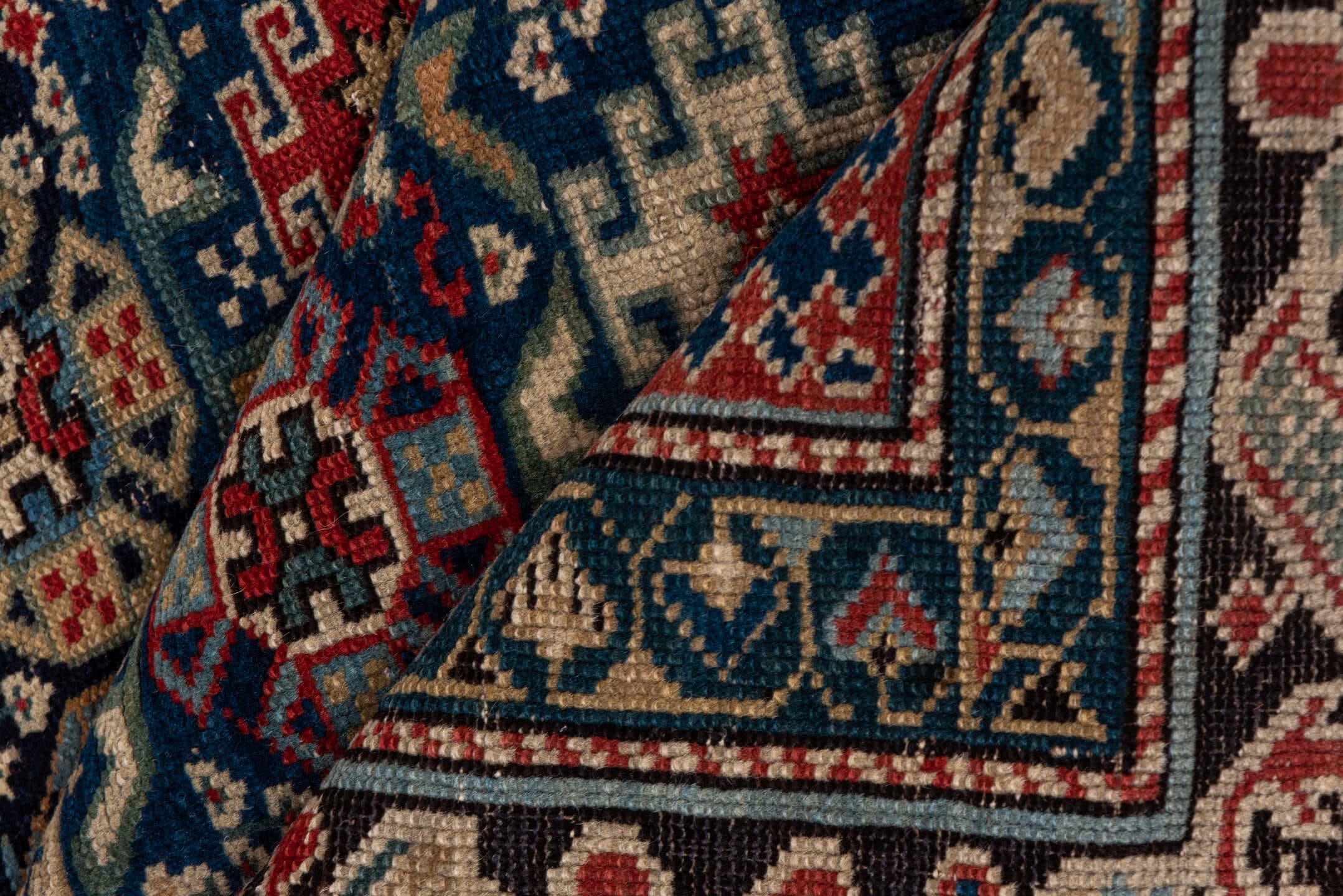 3' x 5' one-of-a-kind handmade antique Chichi small size rug. Color palette: navy, ivory, red, sky_blue, charcoal, camel