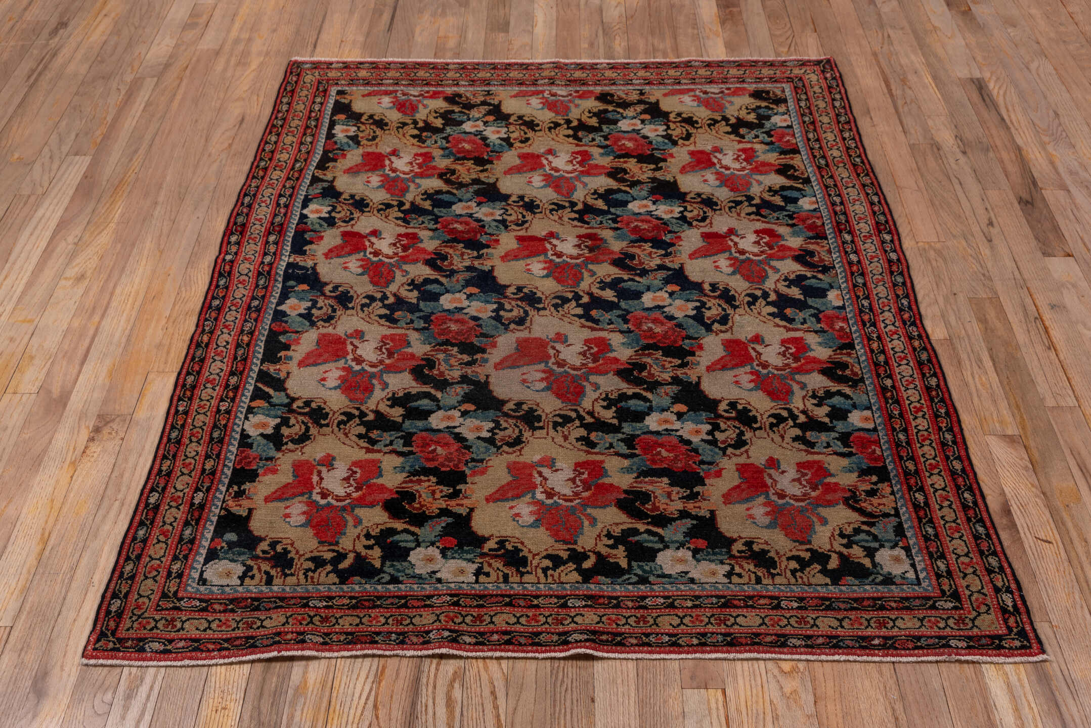 4' x 5' one-of-a-kind handmade vintage Malayer small size rug. Color palette: black, brown, gray, pink, red